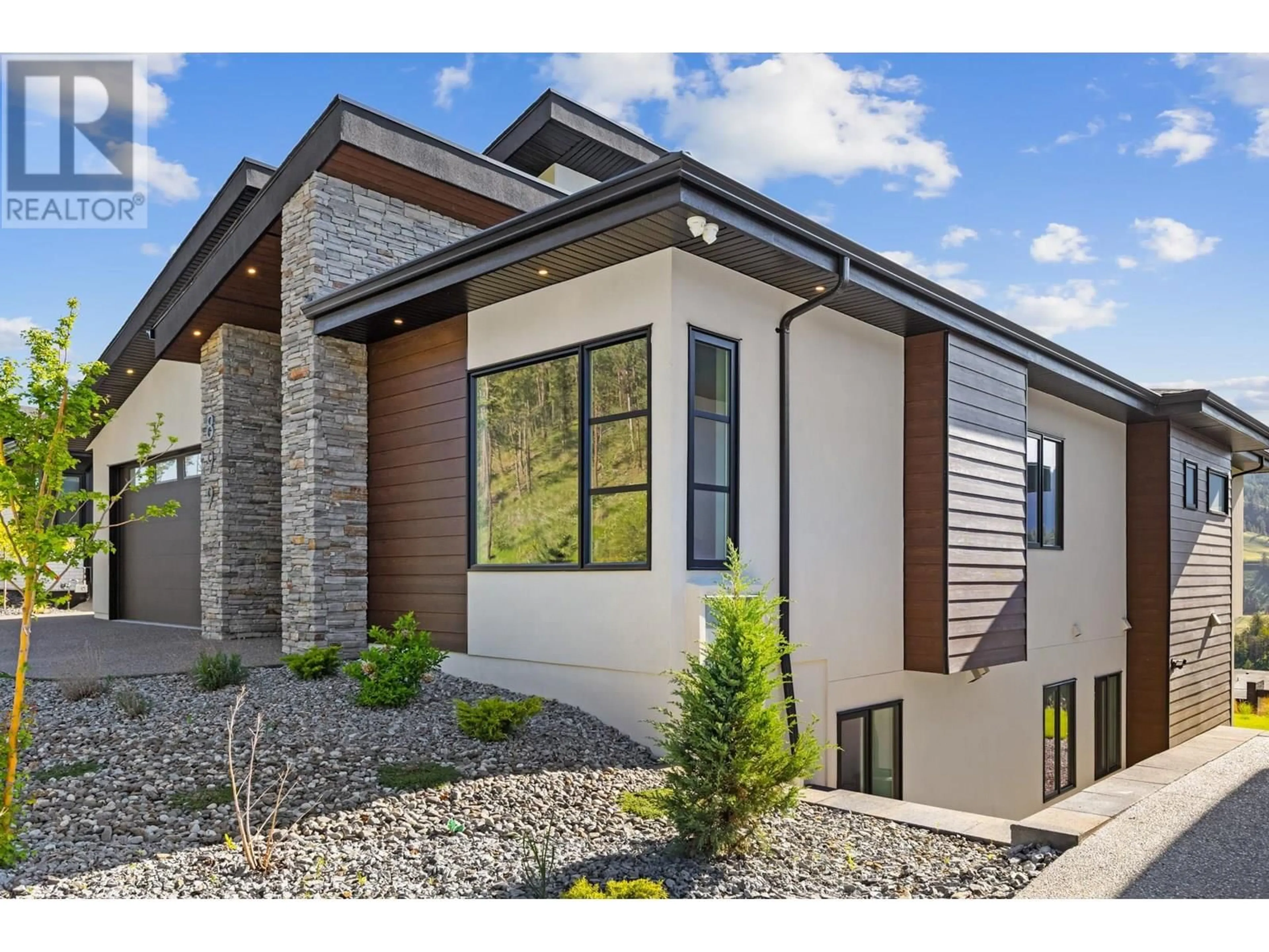Home with brick exterior material, unknown for 899 LOSETH DRIVE, Kelowna British Columbia V1P0A8