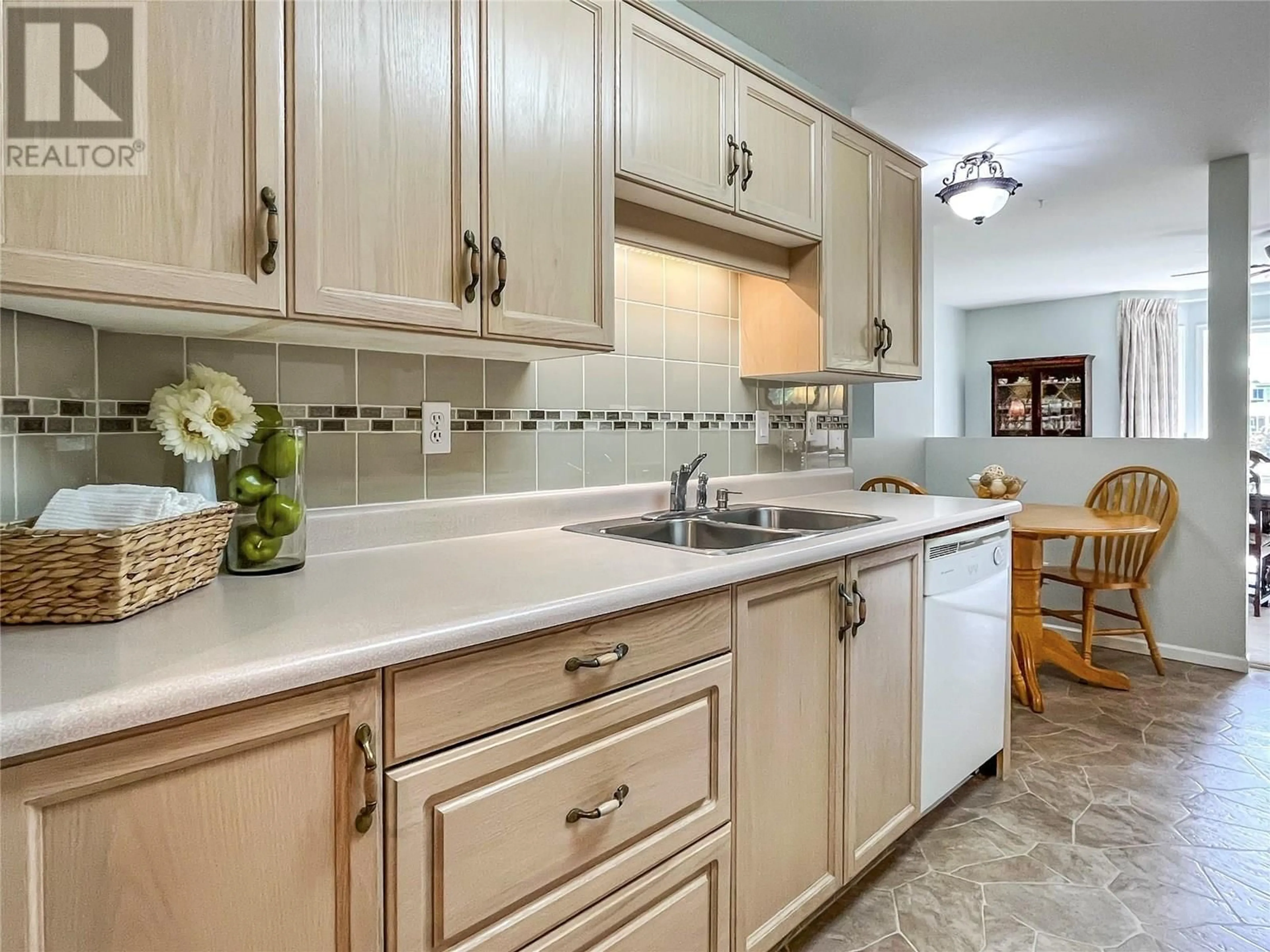 Standard kitchen, ceramic/tile floor for 202 - 8905 PINEO COURT, Summerland British Columbia V0H1Z5