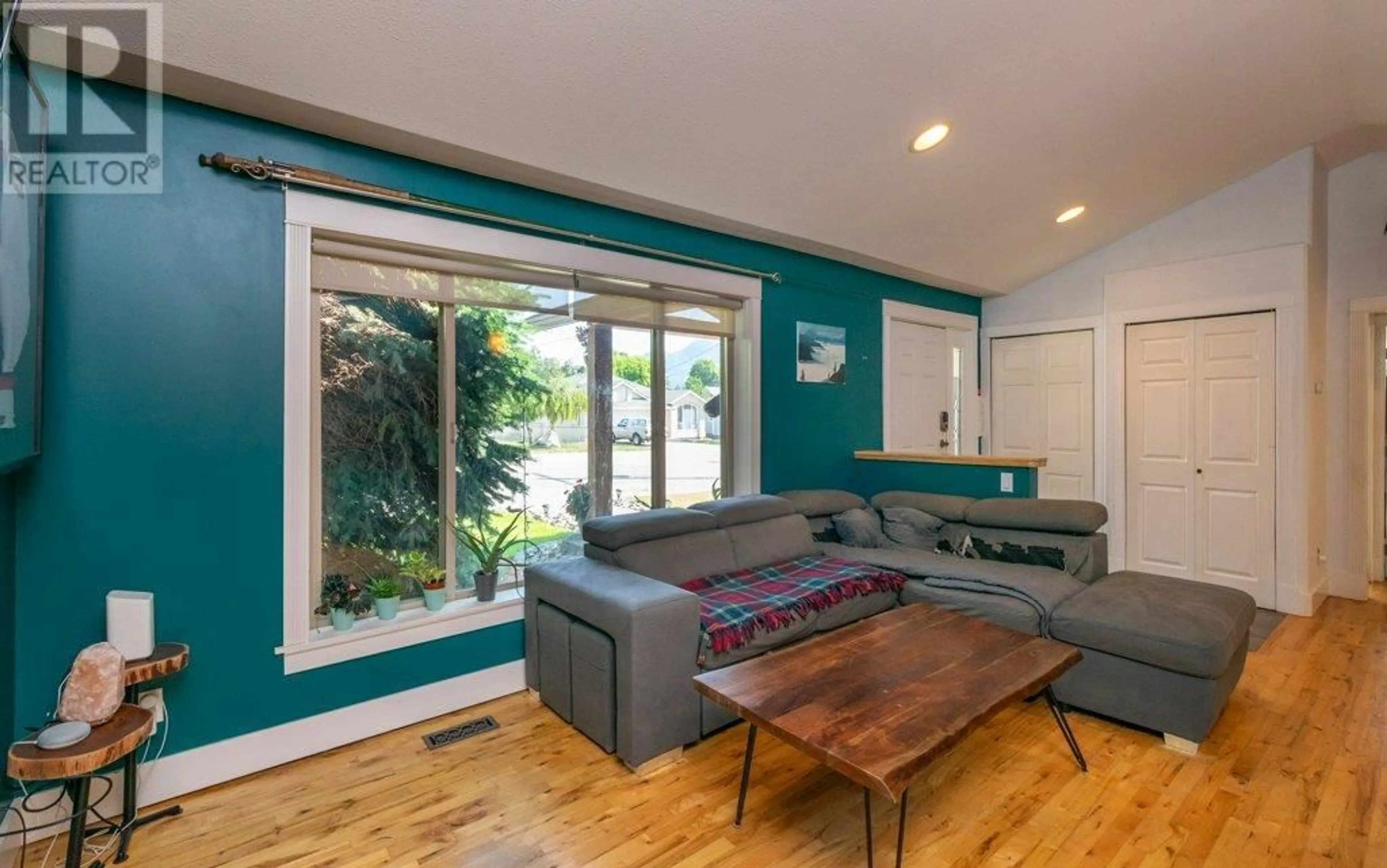 Living room with furniture, wood/laminate floor for 714 STANLEY AVENUE, Enderby British Columbia V0E1V0