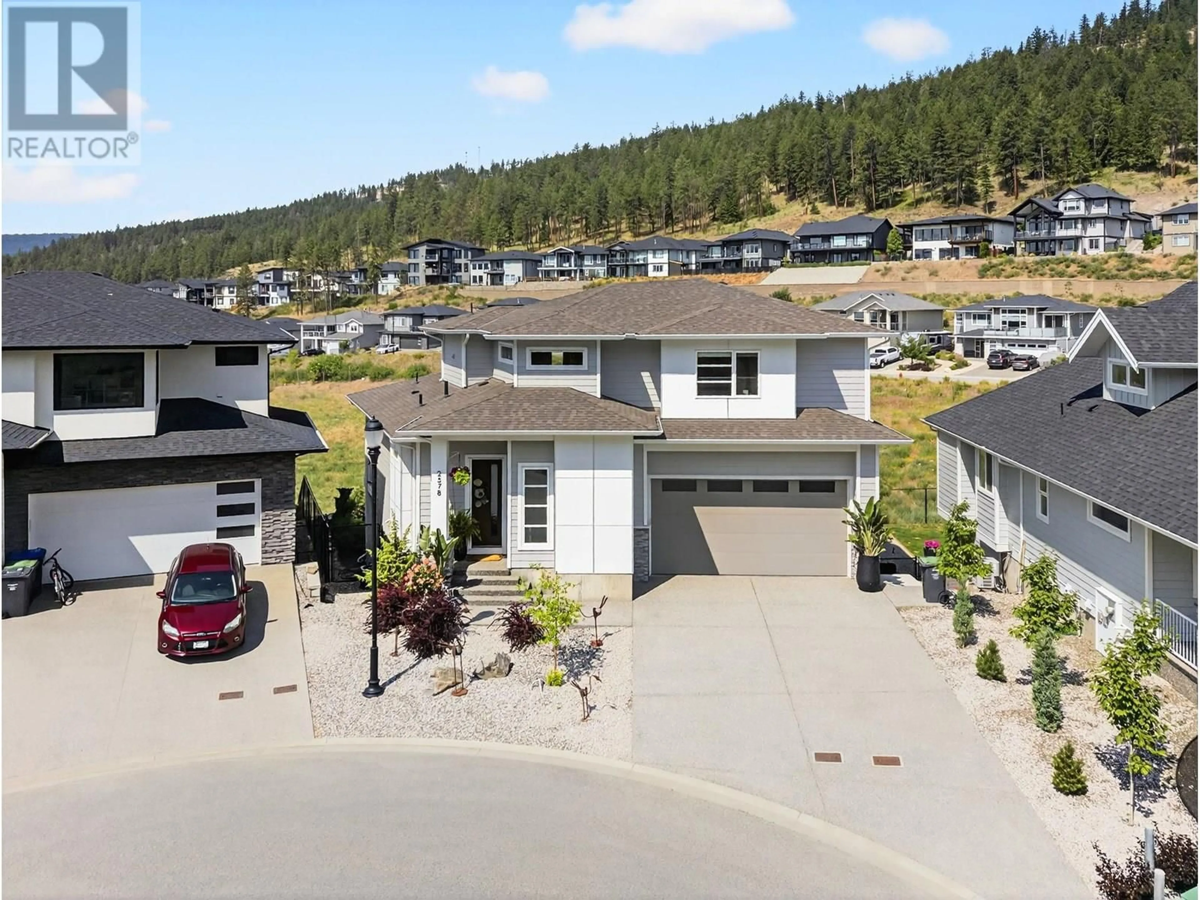 A pic from outside/outdoor area/front of a property/back of a property/a pic from drone, street for 2578 CROWN CREST PLACE, West Kelowna British Columbia V4T3M6