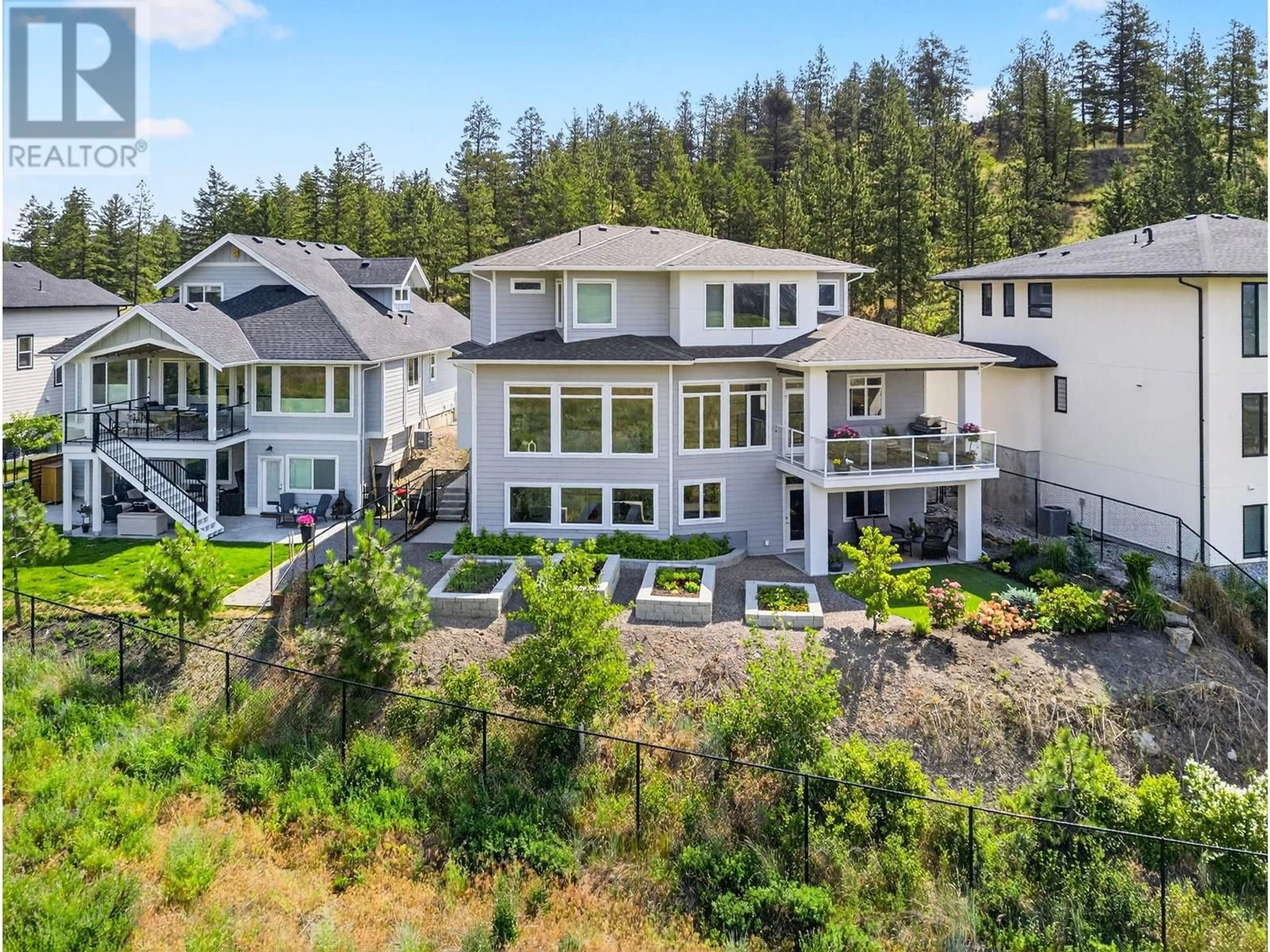 A pic from outside/outdoor area/front of a property/back of a property/a pic from drone, mountain view for 2578 CROWN CREST PLACE, West Kelowna British Columbia V4T3M6
