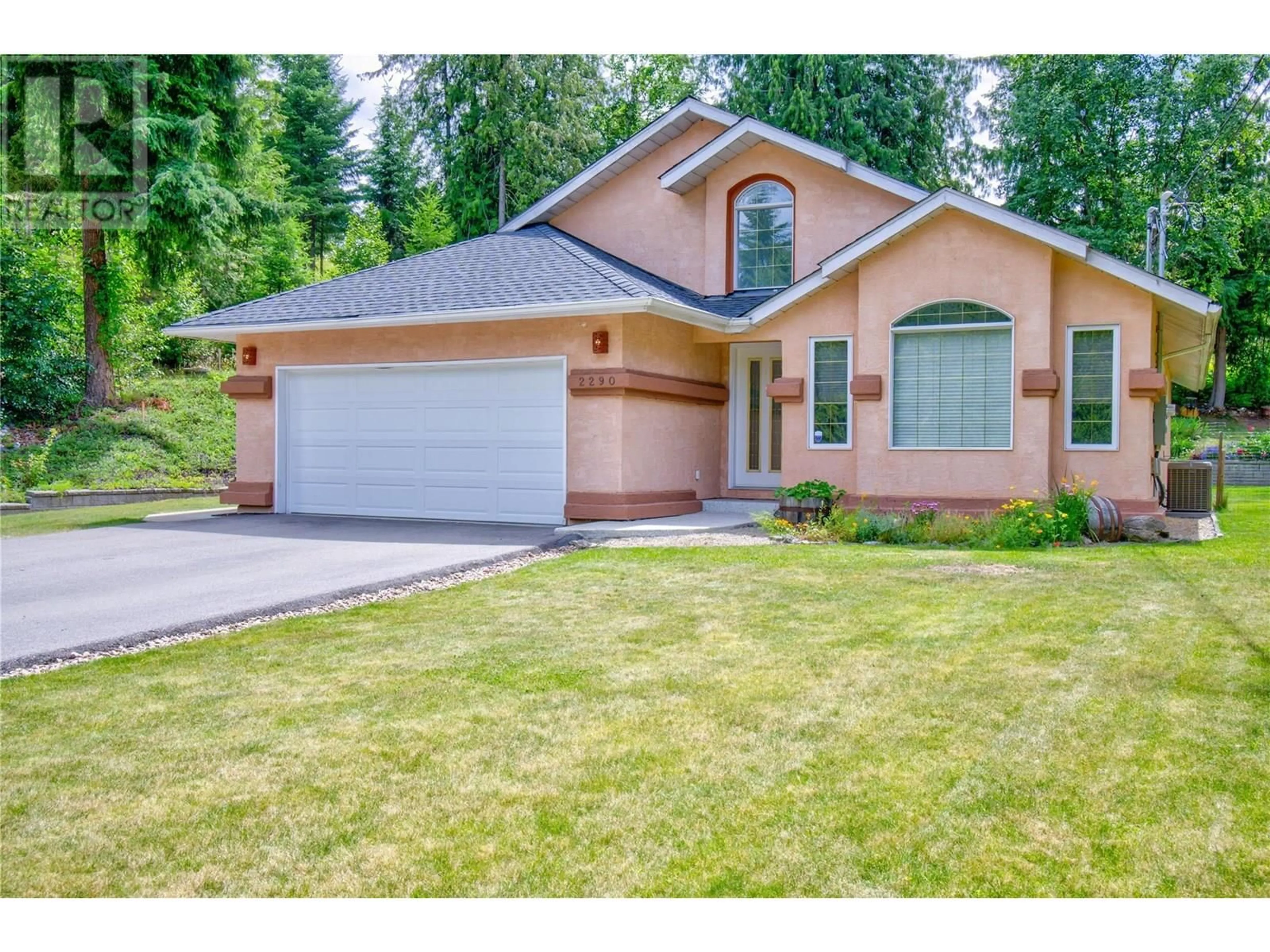 Home with vinyl exterior material, street for 2290 TA LANA TRAIL, Sorrento British Columbia V0E2W2