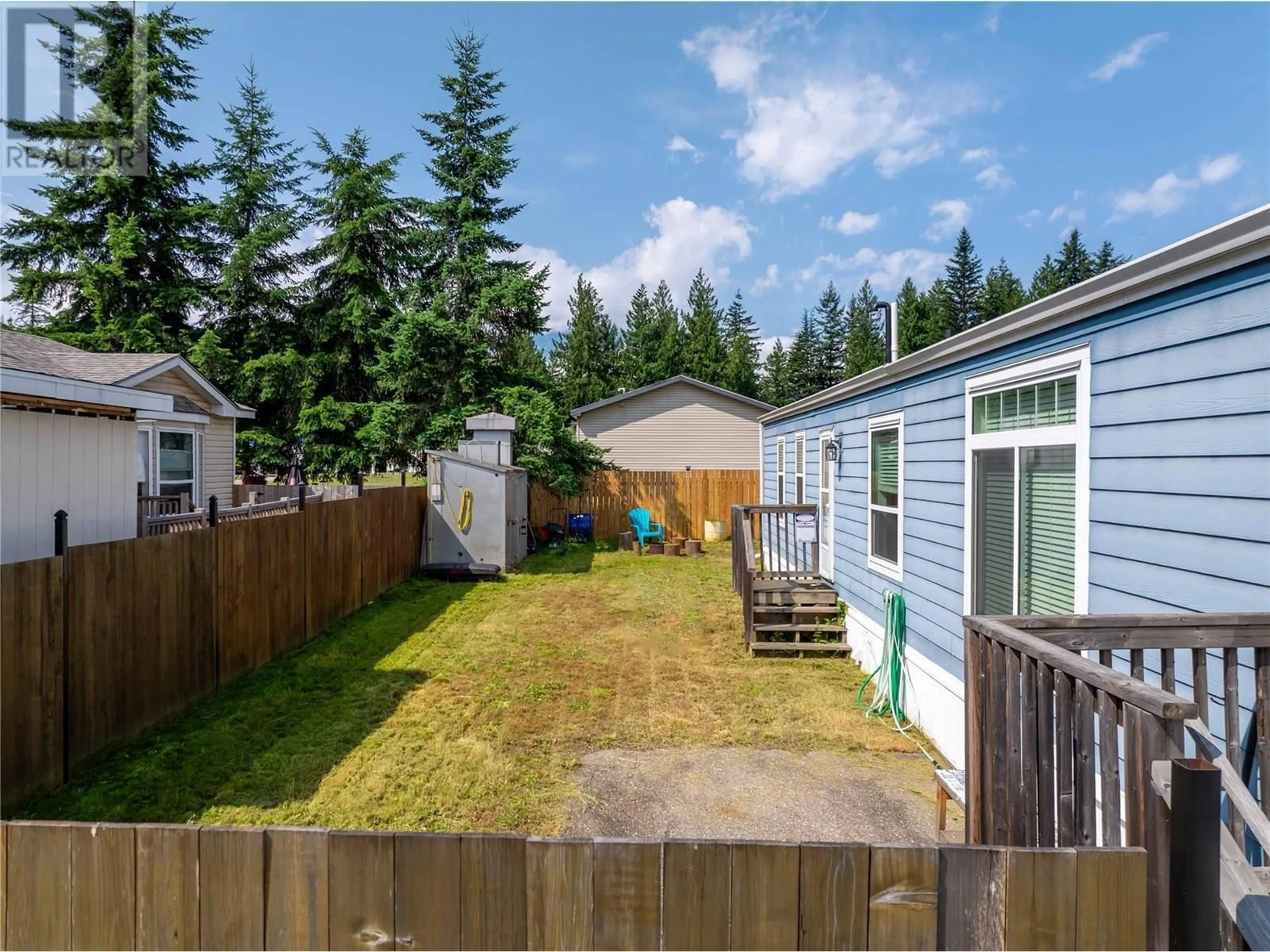 A pic from outside/outdoor area/front of a property/back of a property/a pic from drone, unknown for 38 JOHNSON WAY, Revelstoke British Columbia V0E2S1