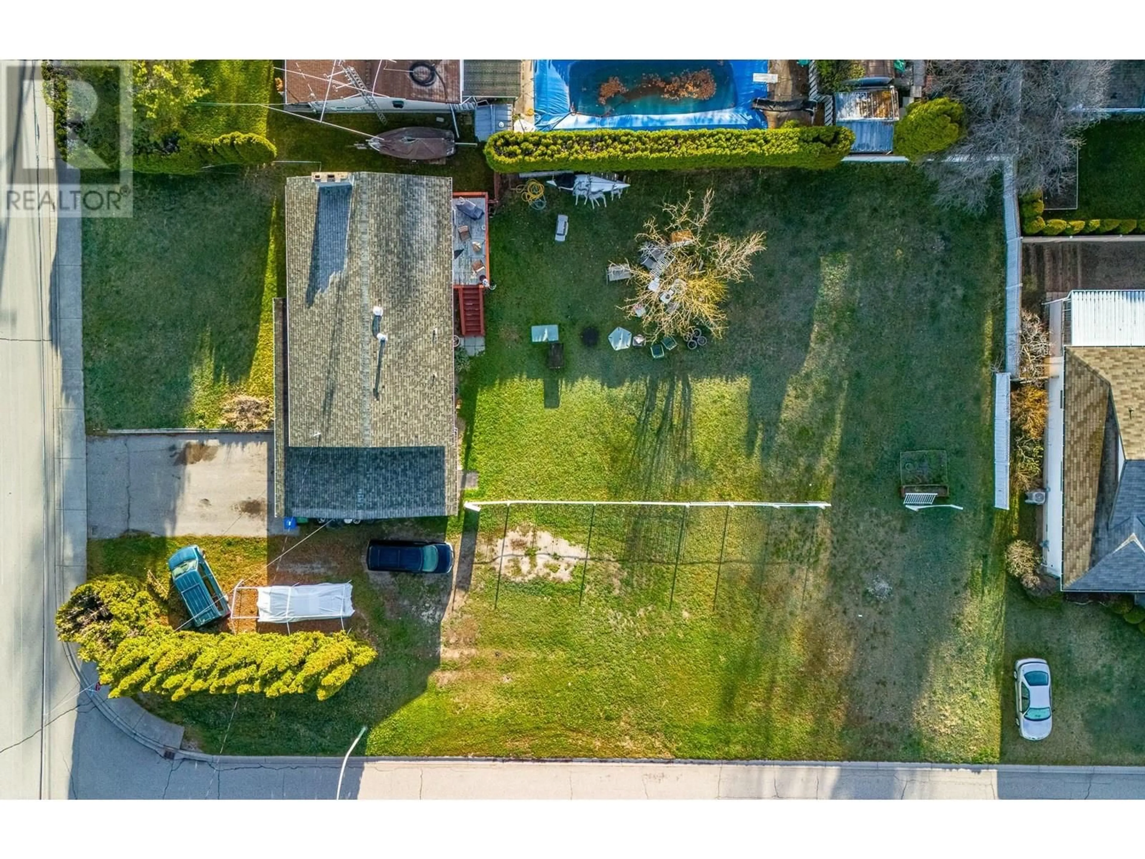 A pic from outside/outdoor area/front of a property/back of a property/a pic from drone, street for 1007 LANFRANCO ROAD, Kelowna British Columbia V1W3X2