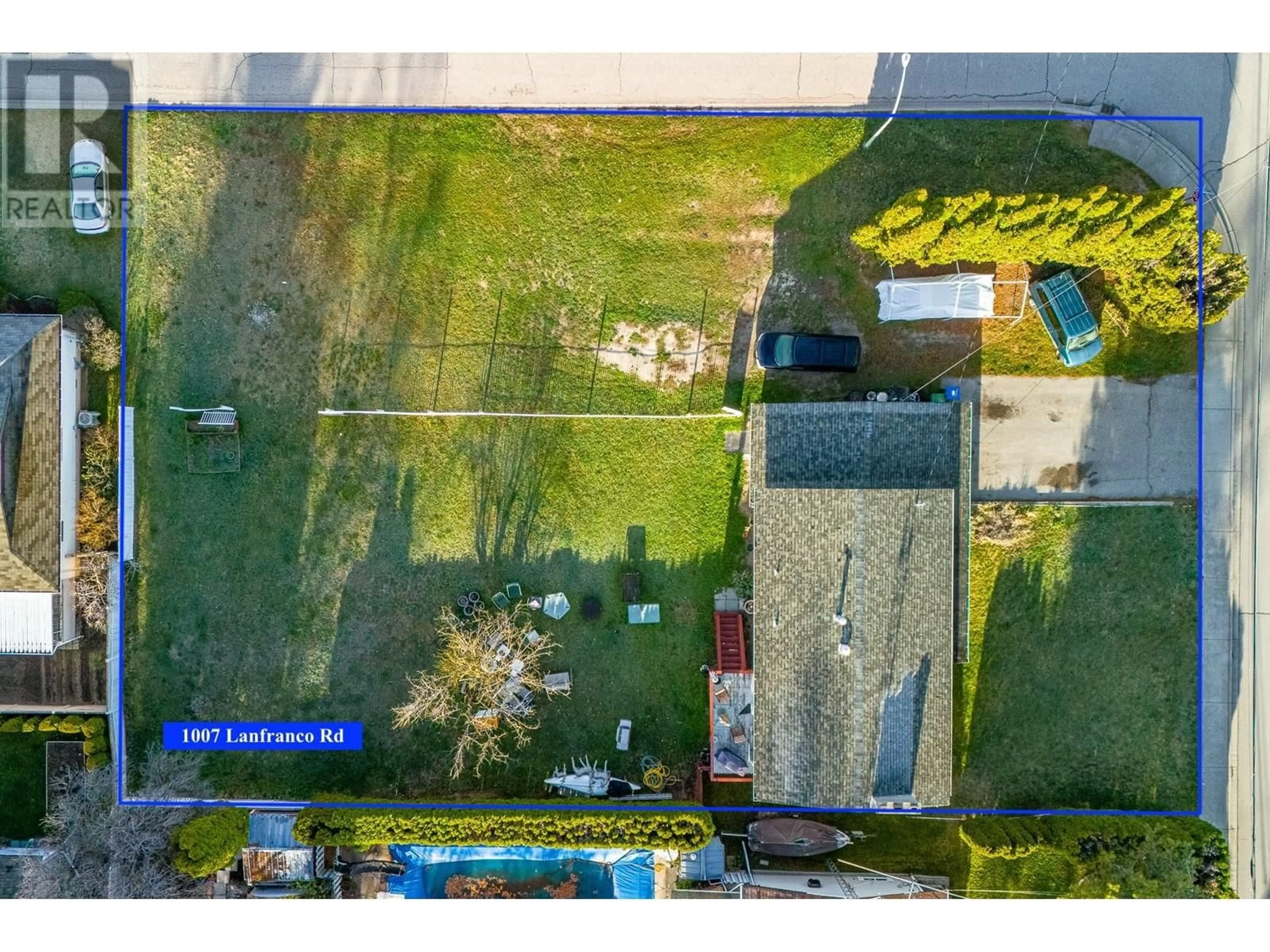 A pic from outside/outdoor area/front of a property/back of a property/a pic from drone, street for 1007 LANFRANCO ROAD, Kelowna British Columbia V1W3X2