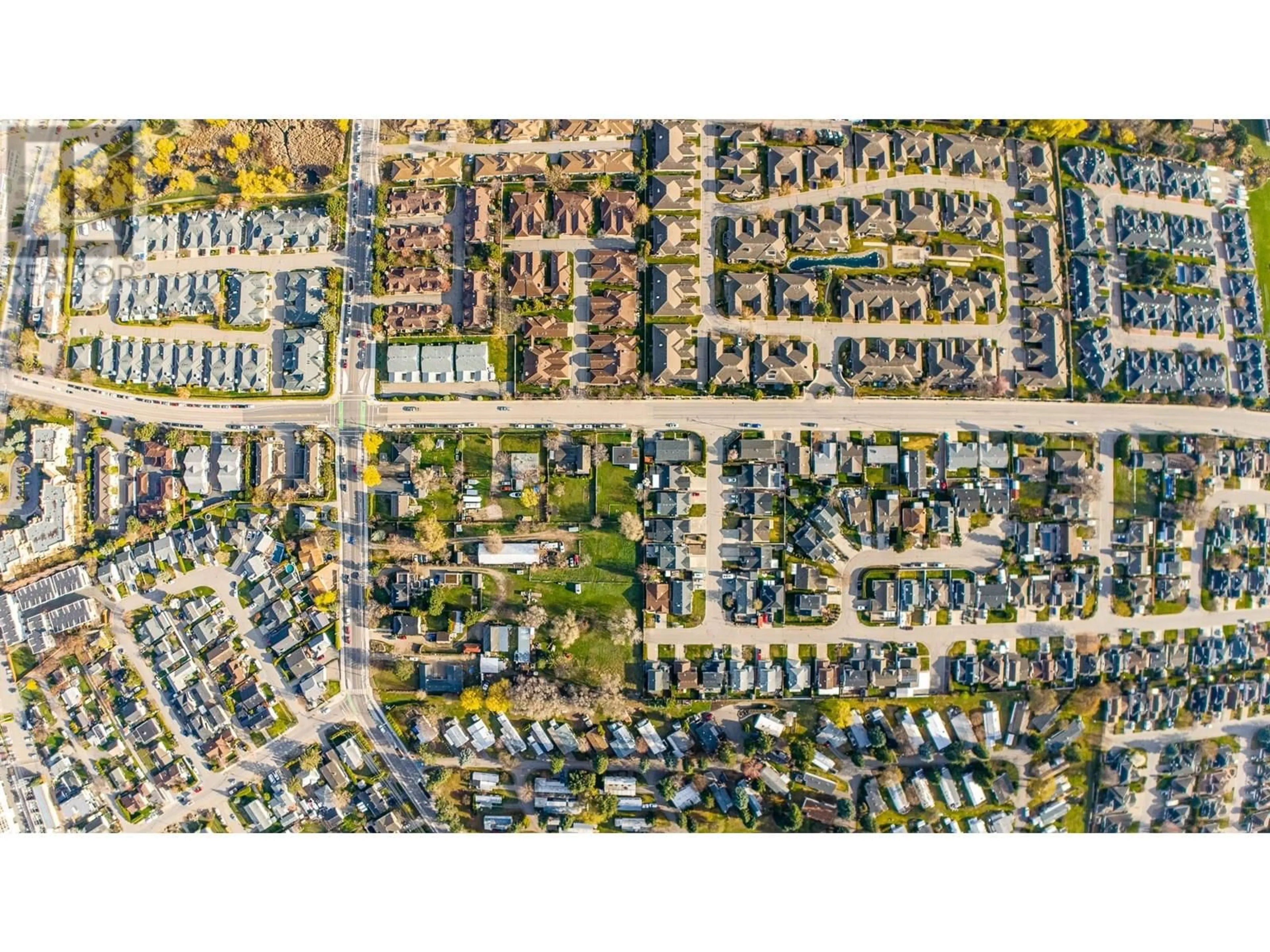 A pic from outside/outdoor area/front of a property/back of a property/a pic from drone, street for 1007 LANFRANCO ROAD, Kelowna British Columbia V1W3X2