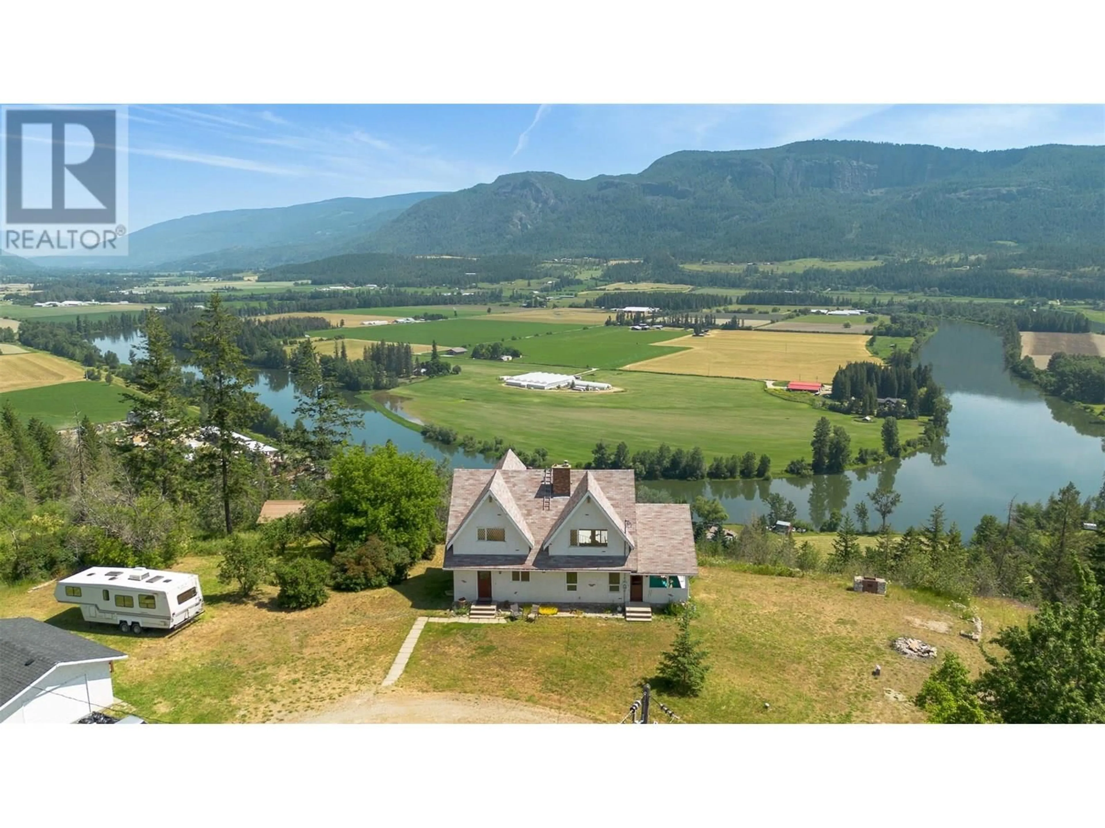 A pic from outside/outdoor area/front of a property/back of a property/a pic from drone, water/lake/river/ocean view for 137 NICHLOUS ROAD, Enderby British Columbia V4Y4G4