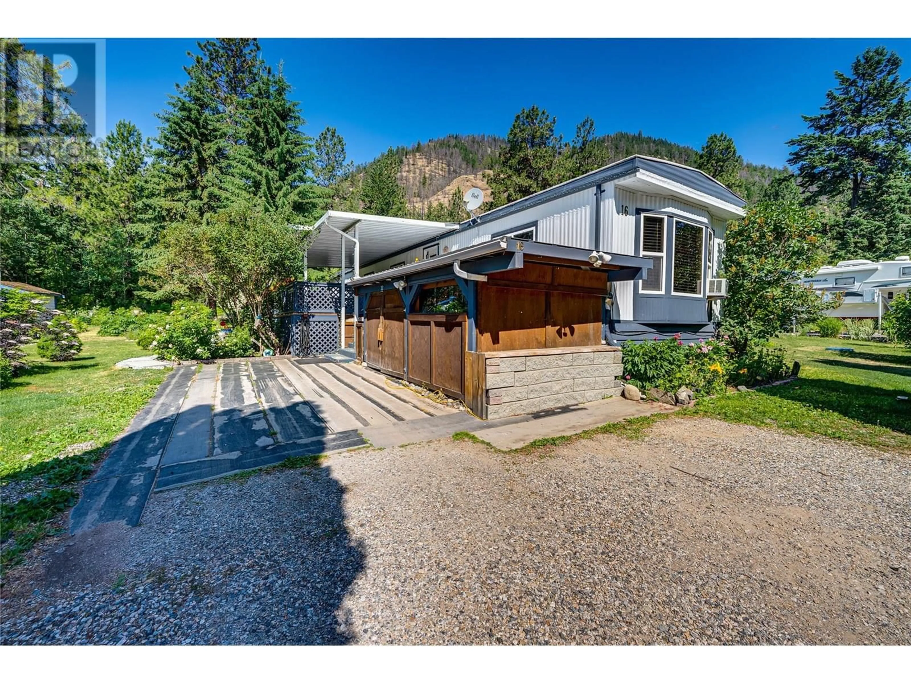 A pic from outside/outdoor area/front of a property/back of a property/a pic from drone, mountain view for 16 - 12069 WESTSIDE ROAD, Vernon British Columbia V1H2A5