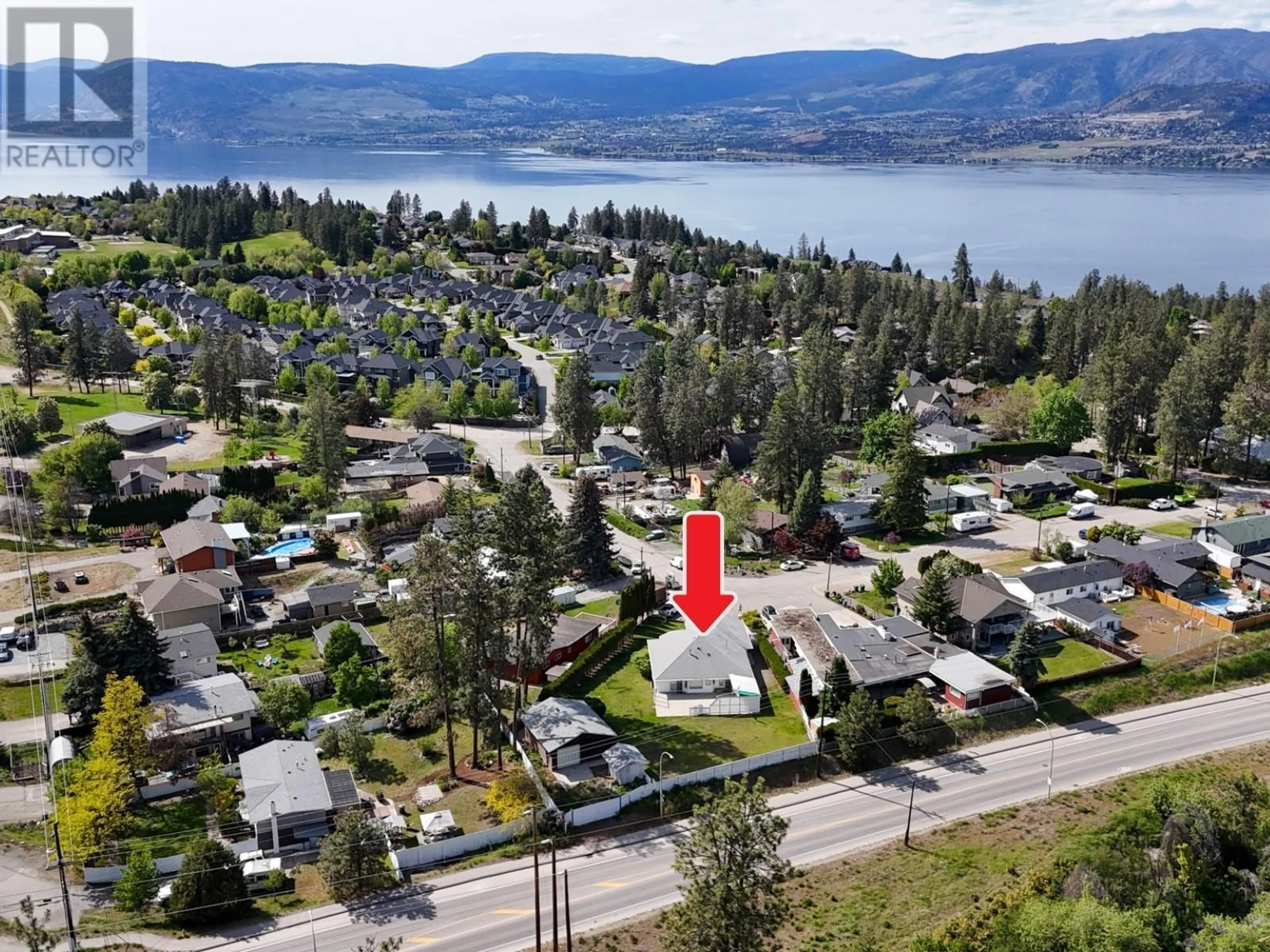A pic from outside/outdoor area/front of a property/back of a property/a pic from drone, unknown for 501 STANLEY CRESCENT, Kelowna British Columbia V1W4L8