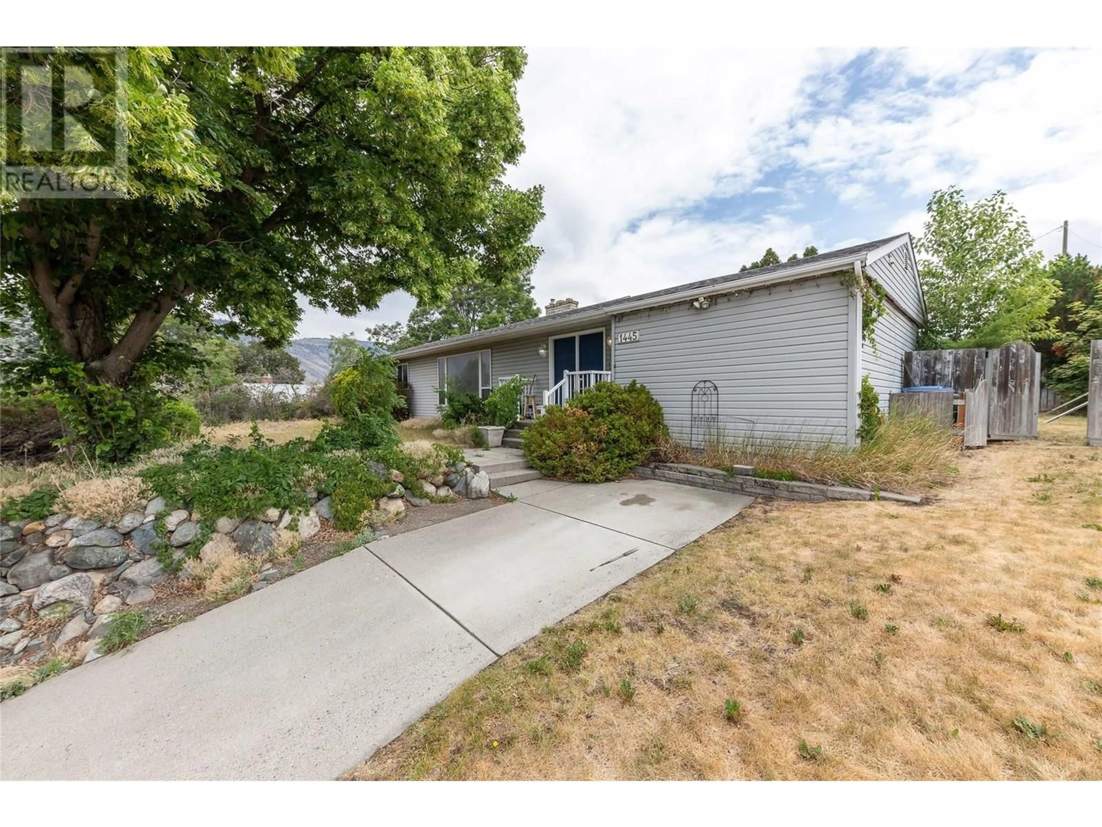 Home with vinyl exterior material, street for 1445 PINE CRESCENT, Kamloops British Columbia V2C2Z2