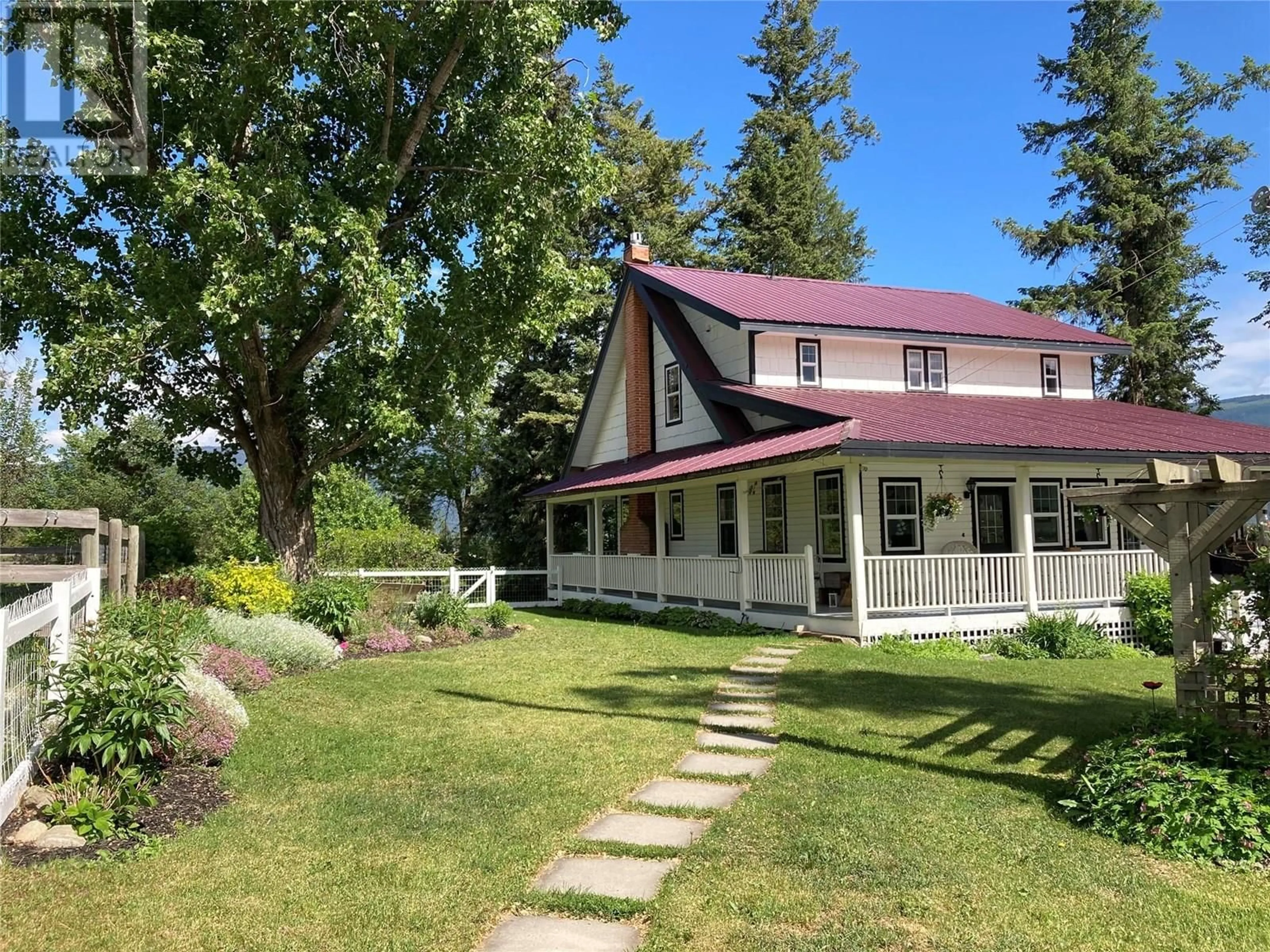 A pic from outside/outdoor area/front of a property/back of a property/a pic from drone, street for 4365 ROUND PRAIRIE ROAD, Armstrong British Columbia V4Y0L1