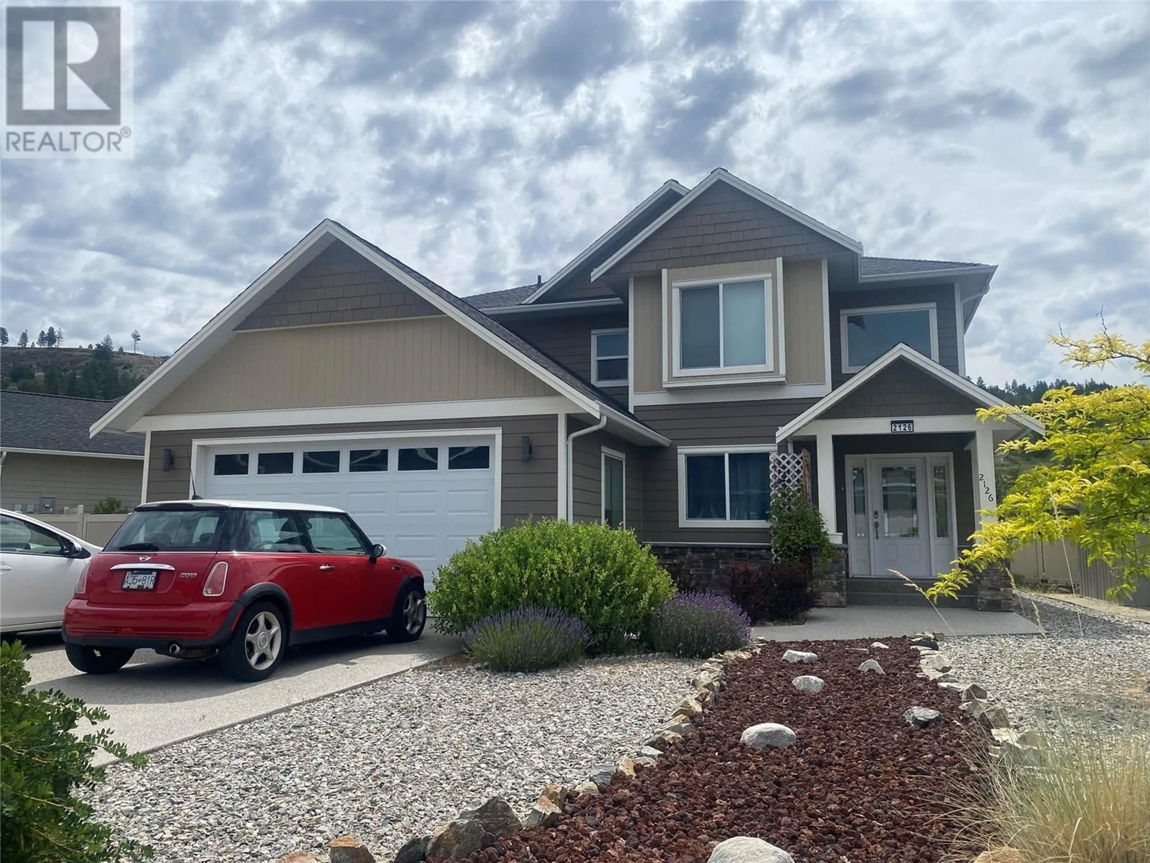Home with vinyl exterior material, street for 2126 LAWRENCE AVENUE, Penticton British Columbia V2A9G5