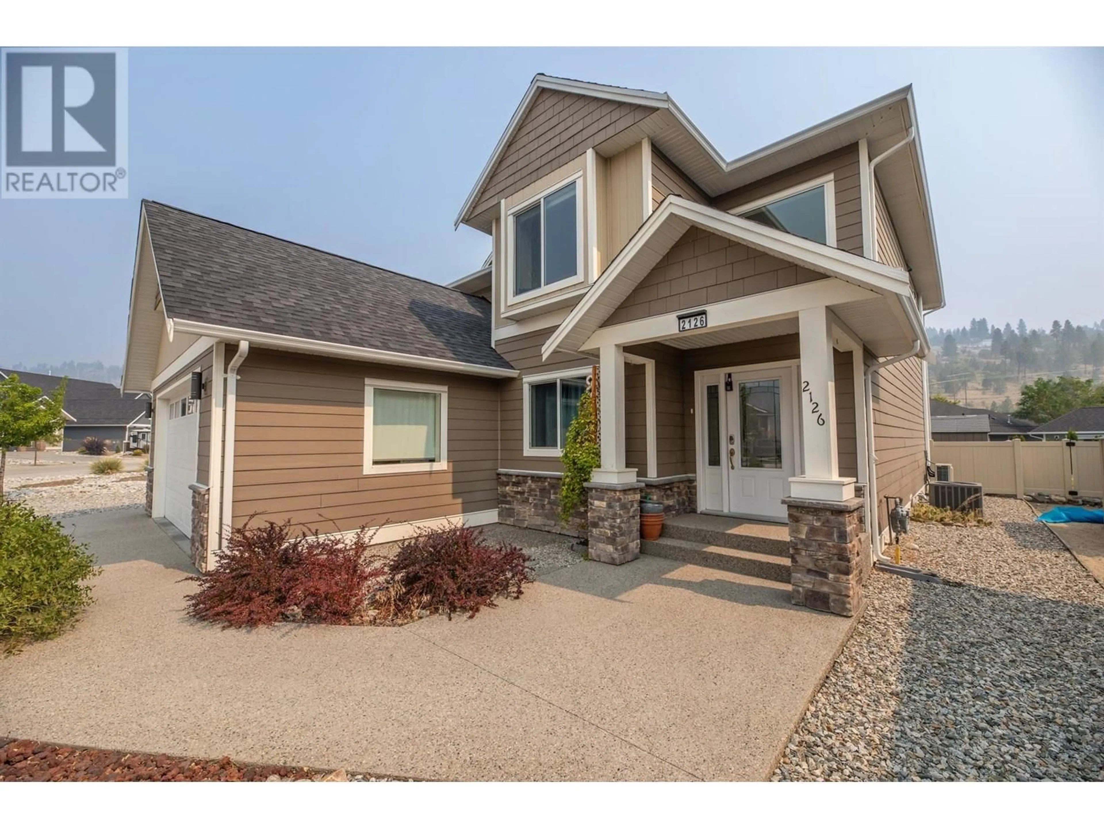 Home with vinyl exterior material, street for 2126 LAWRENCE AVENUE, Penticton British Columbia V2A9G5