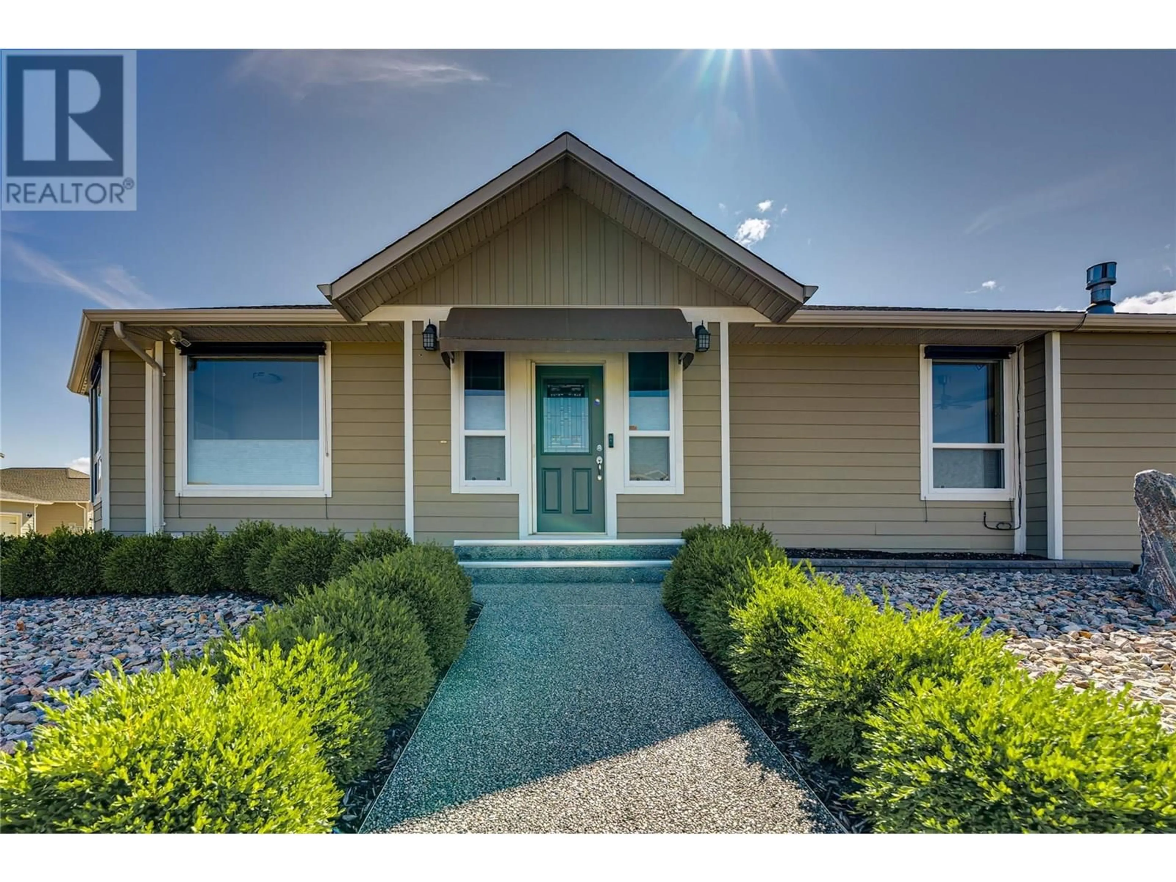 Home with vinyl exterior material, street for 2367 OGLOW DRIVE, Armstrong British Columbia V4Y0V9