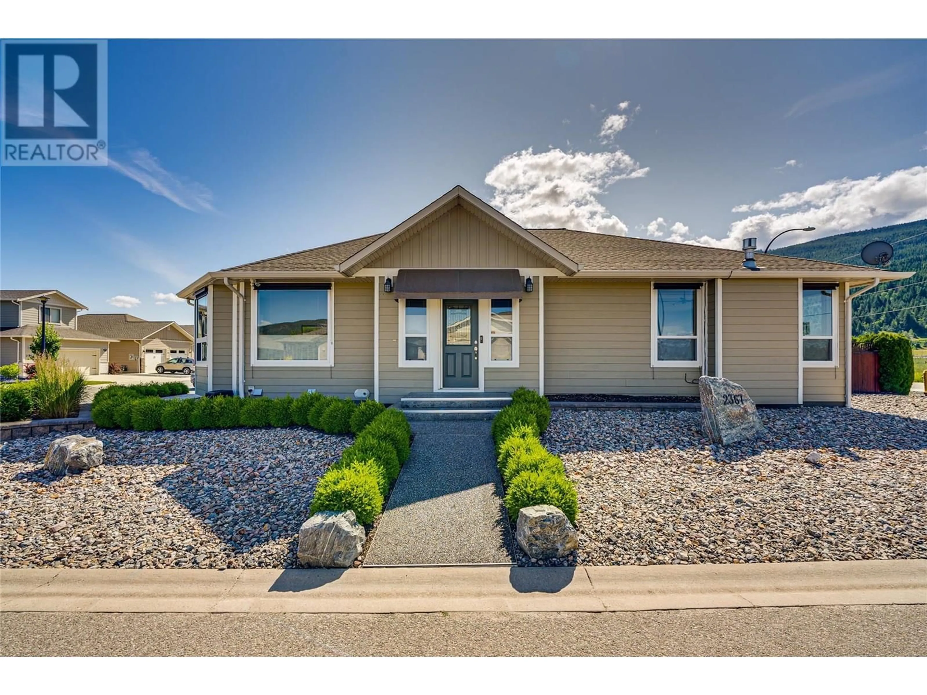 Home with vinyl exterior material, street for 2367 OGLOW DRIVE, Armstrong British Columbia V4Y0V9
