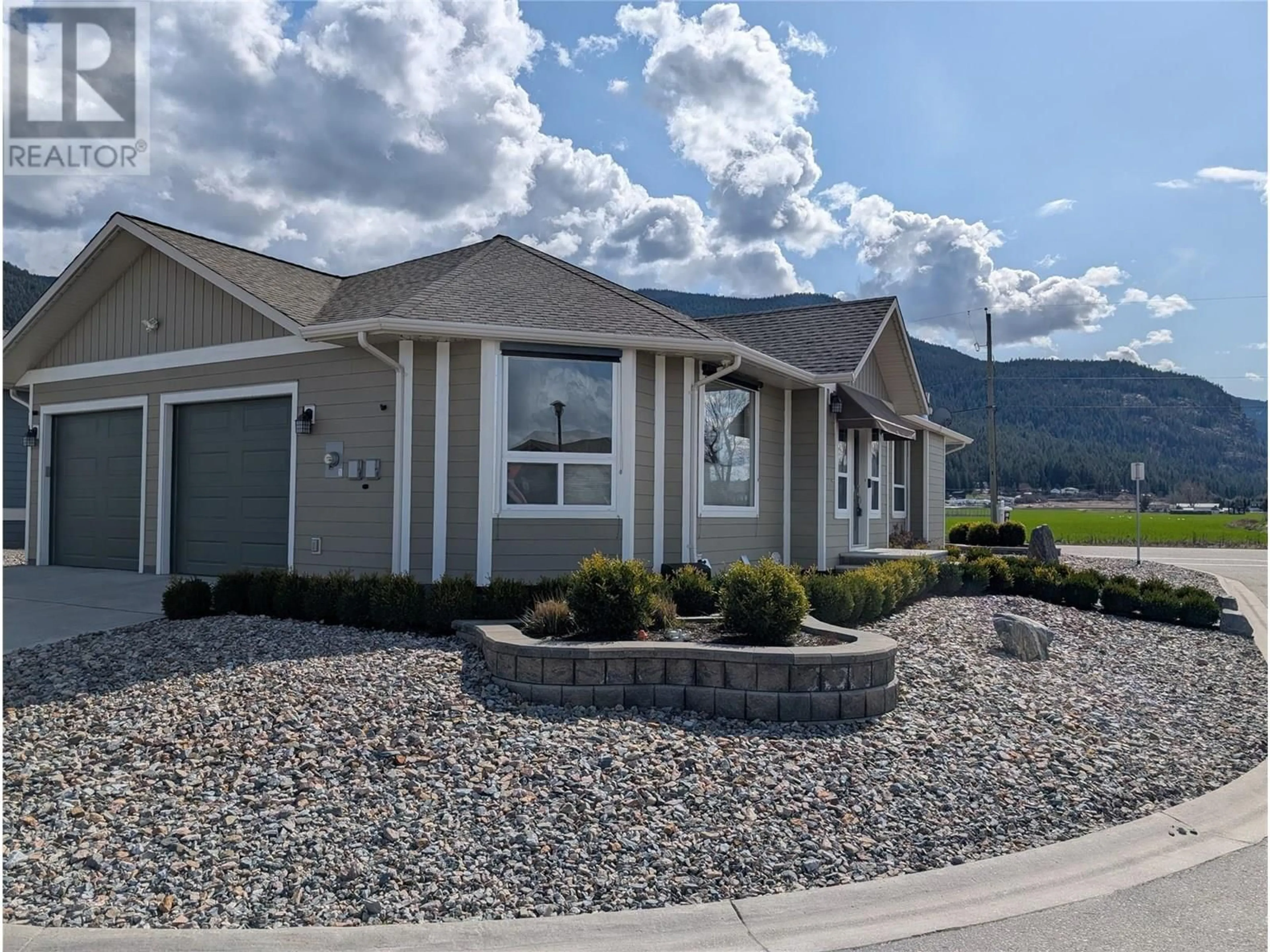 Home with vinyl exterior material, mountain view for 2367 OGLOW DRIVE, Armstrong British Columbia V4Y0V9