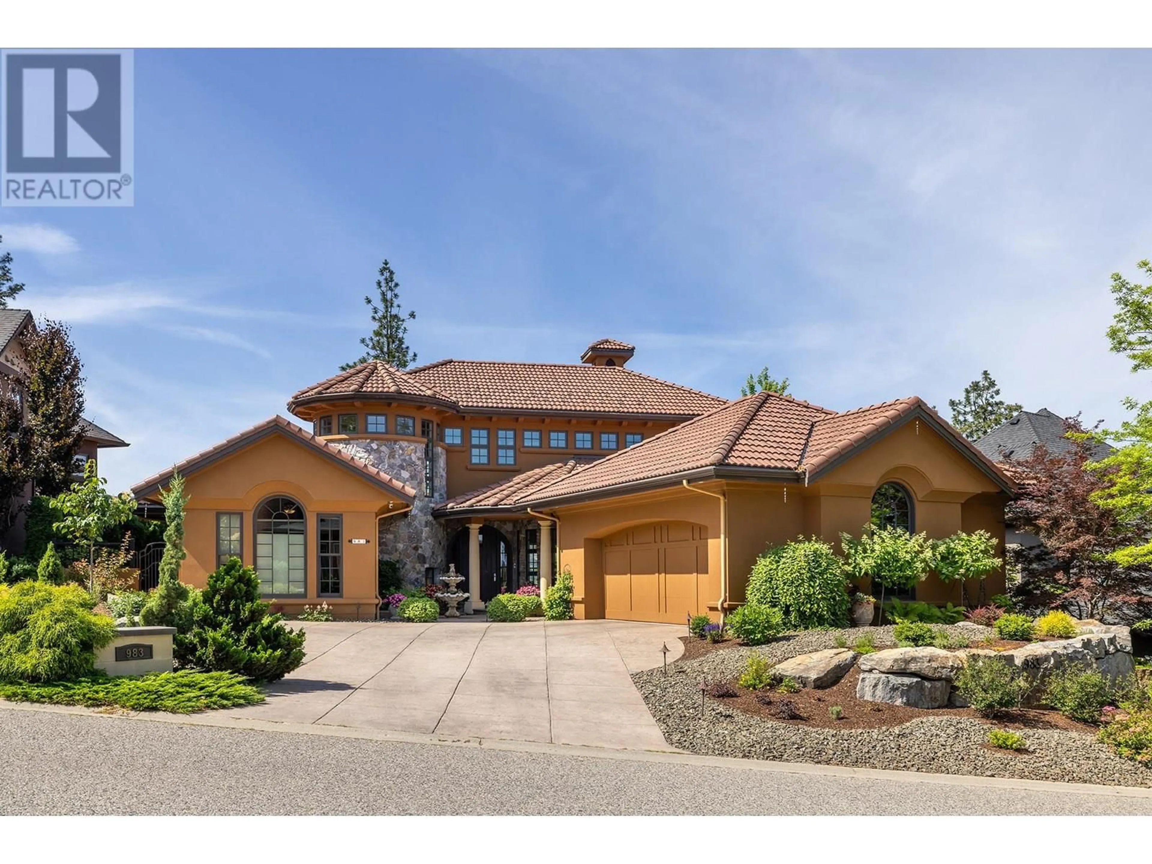 Home with brick exterior material, street for 983 WESTPOINT DRIVE, Kelowna British Columbia V1W4Z9