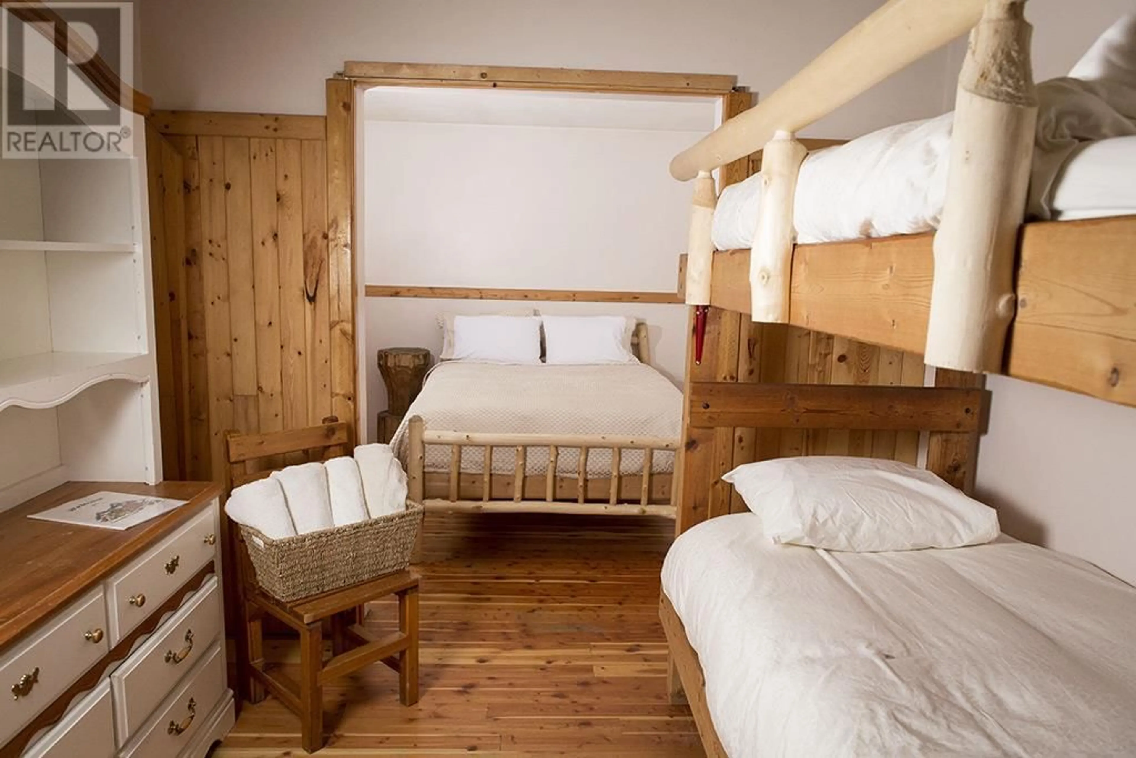 Bedroom with bed, wood/laminate floor for 4227-4233 BEAVERFOOT FOREST SERVICE ROAD, Golden British Columbia V0A1H0