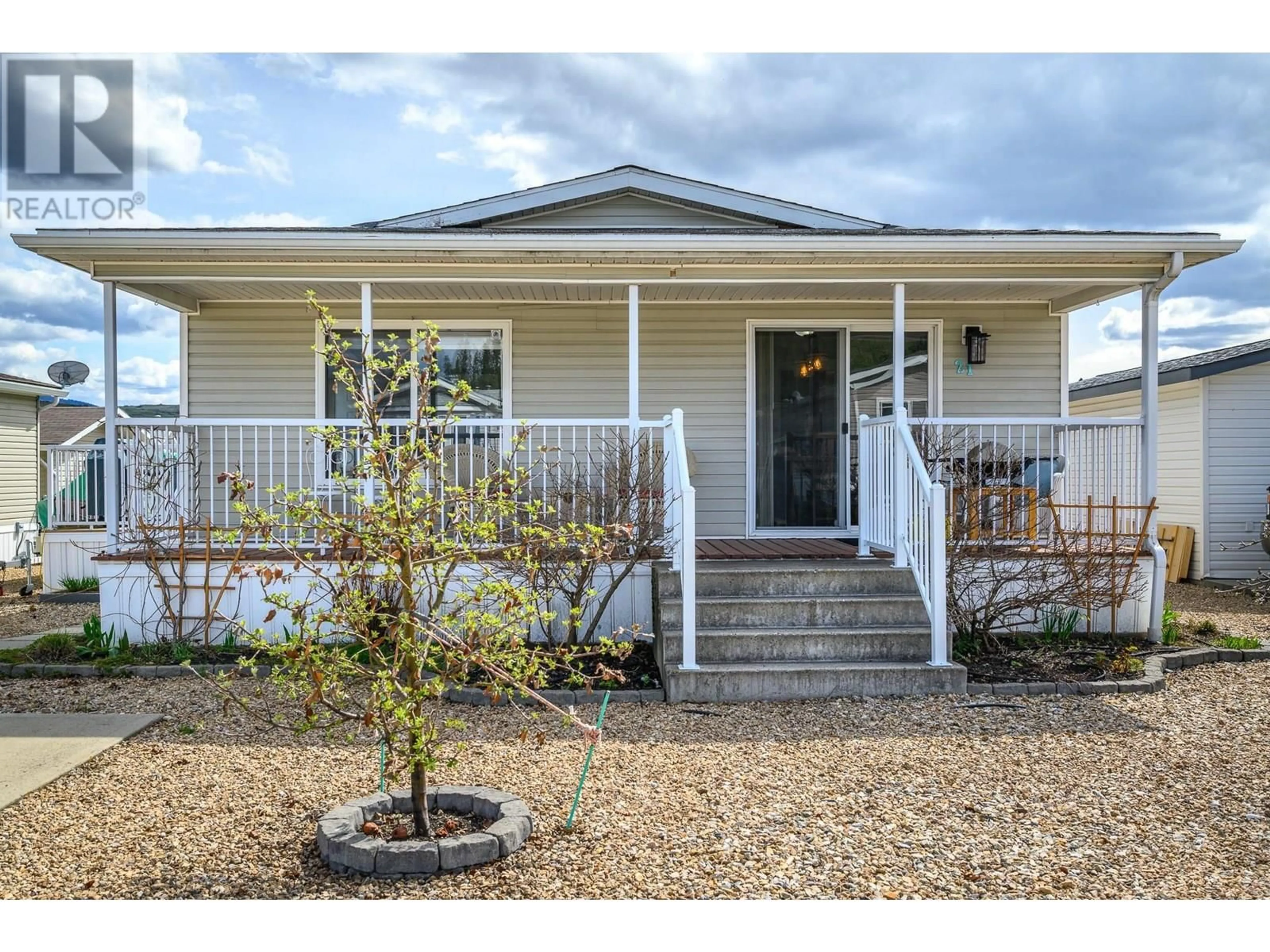Home with vinyl exterior material, street for 21 - 12560 WESTSIDE ROAD, Vernon British Columbia V1H1S9