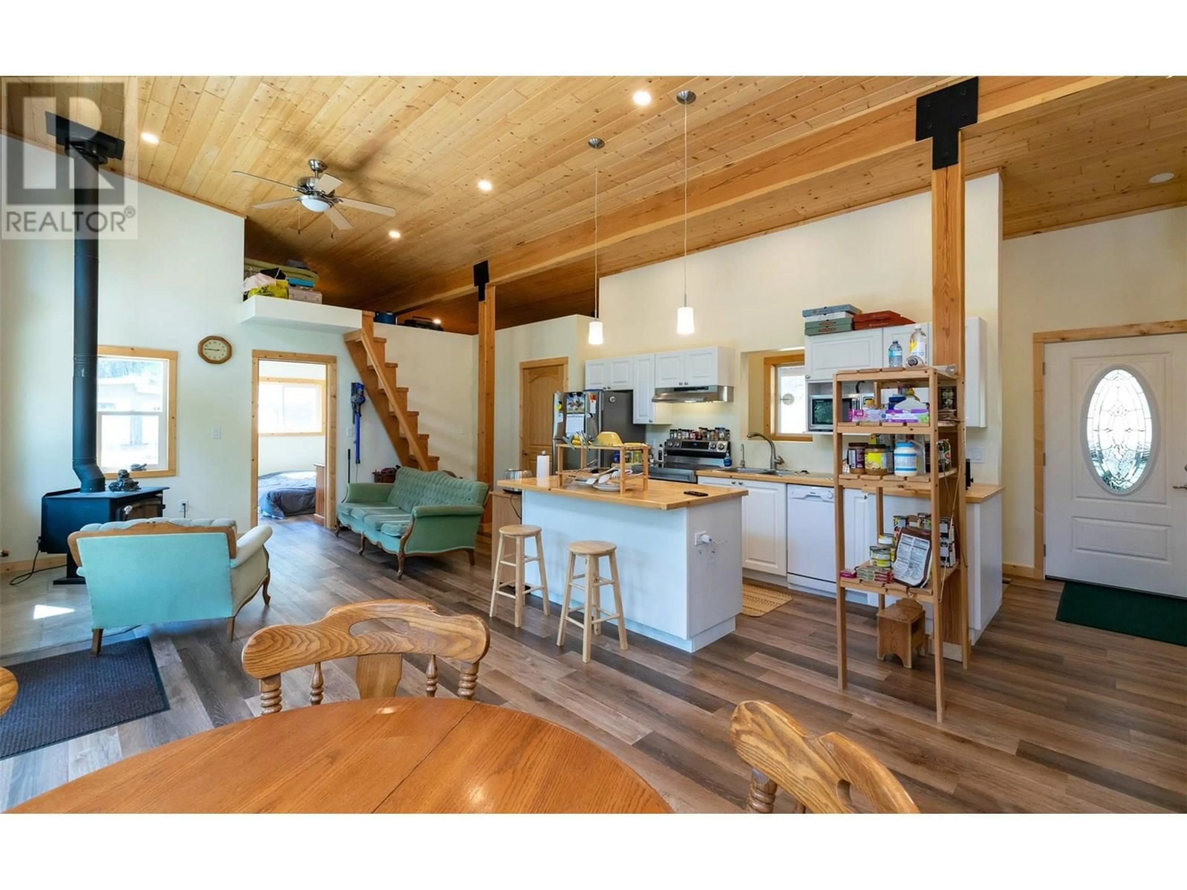Open concept kitchen, wood/laminate floor for 1771 SKIMIKIN ROAD, Tappen British Columbia V0E2X0