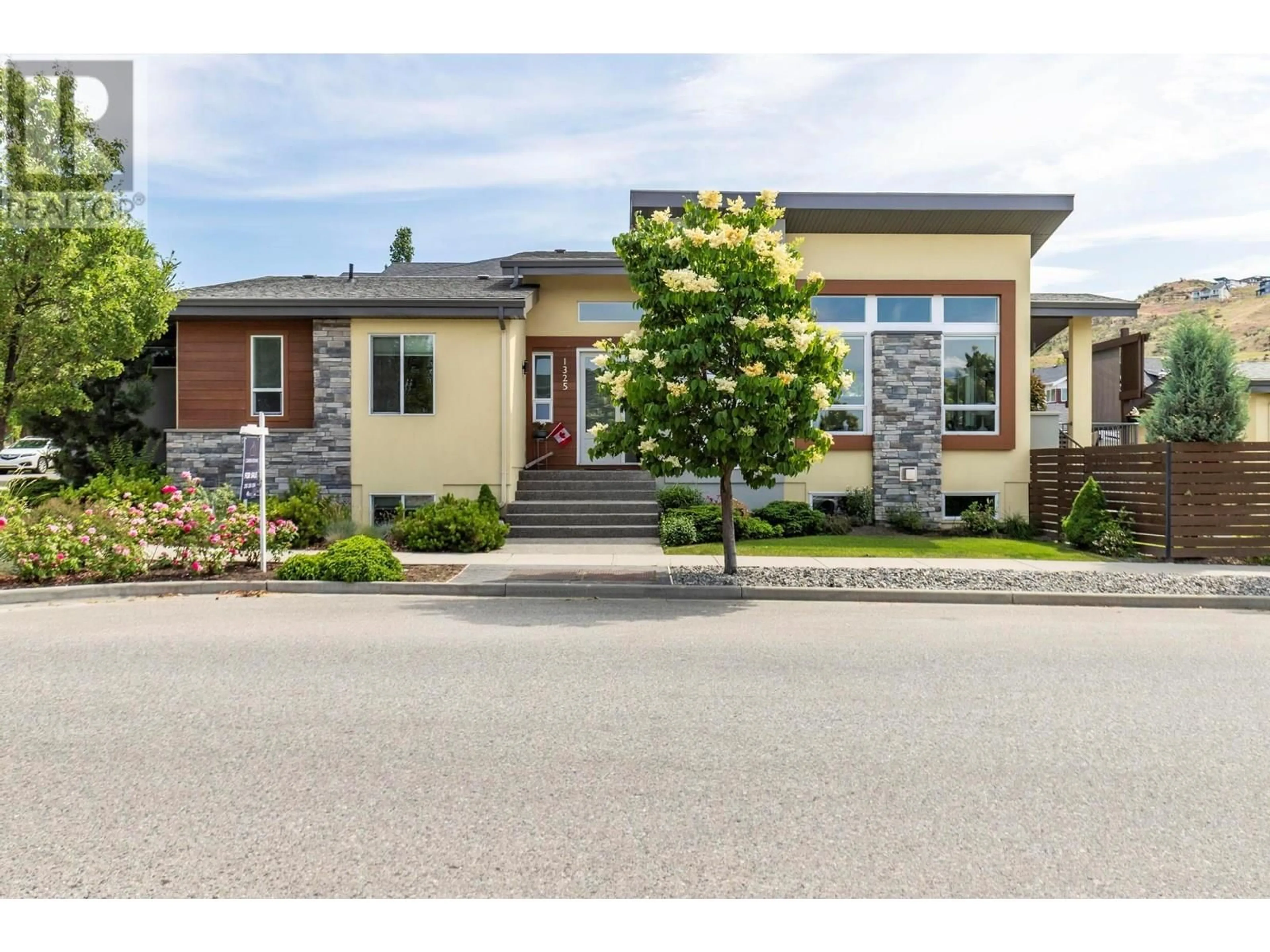 Home with brick exterior material, street for 1325 STEELE ROAD, Kelowna British Columbia V1W5L8