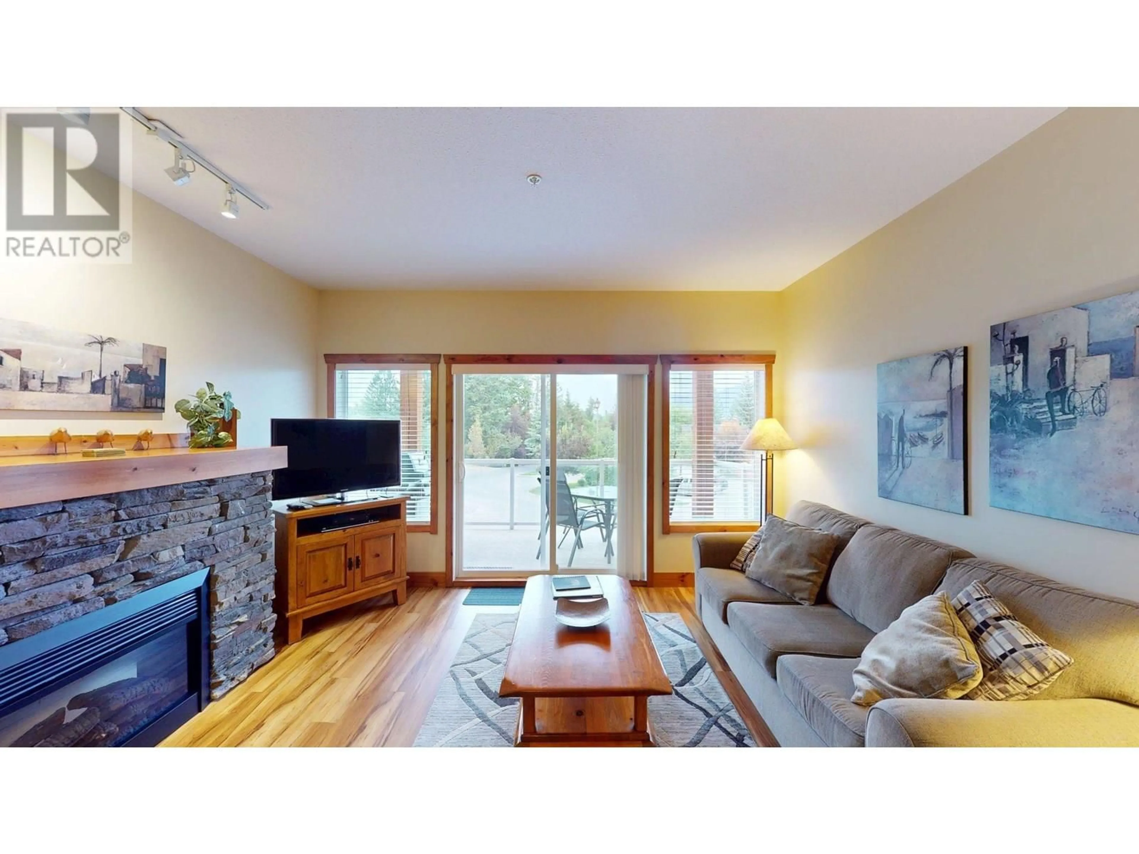 Living room with furniture, wood/laminate floor for 213 I - 701 14A CRESCENT, Invermere British Columbia V0A1K0