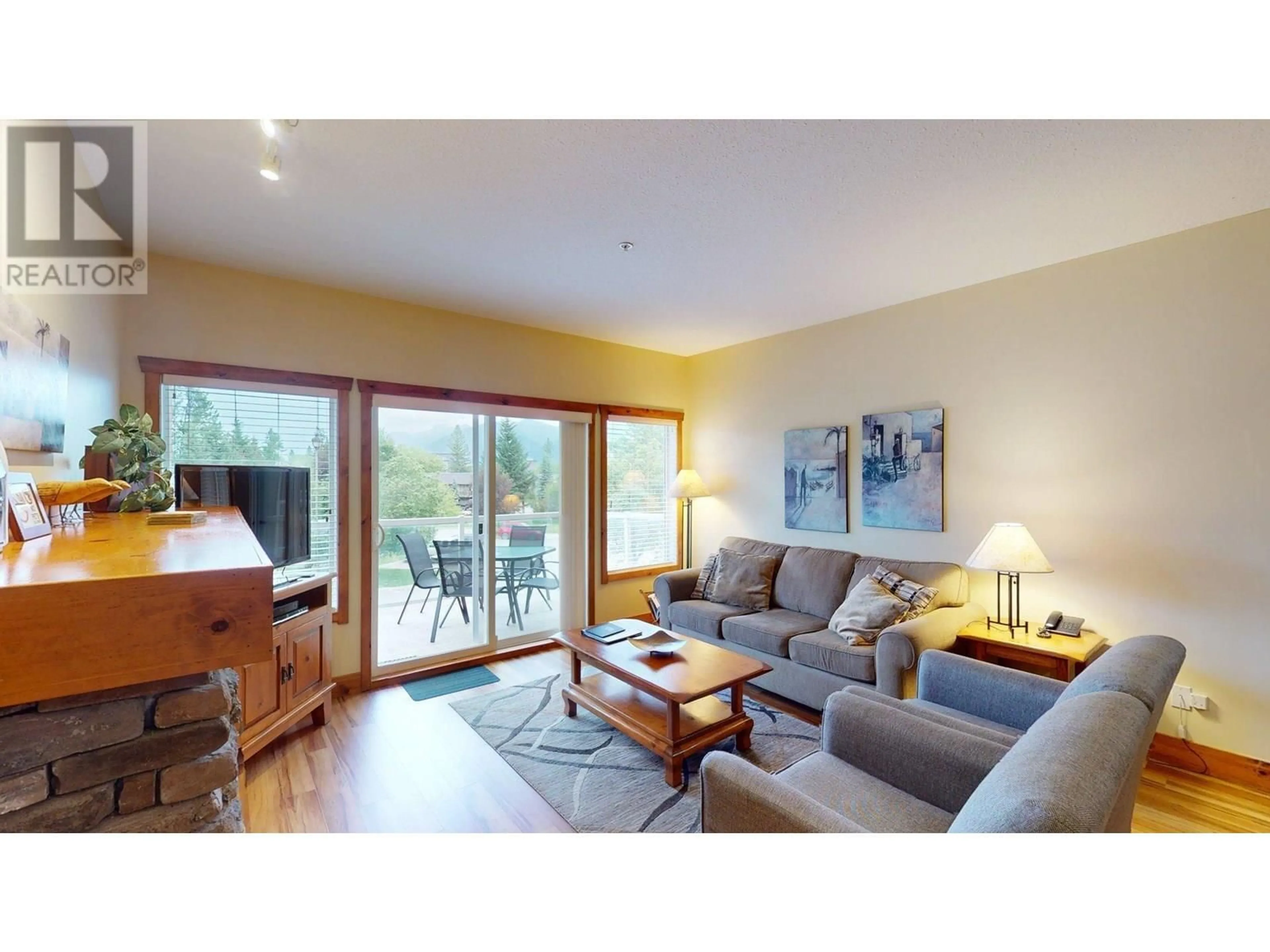 Living room with furniture, wood/laminate floor for 213 I - 701 14A CRESCENT, Invermere British Columbia V0A1K0