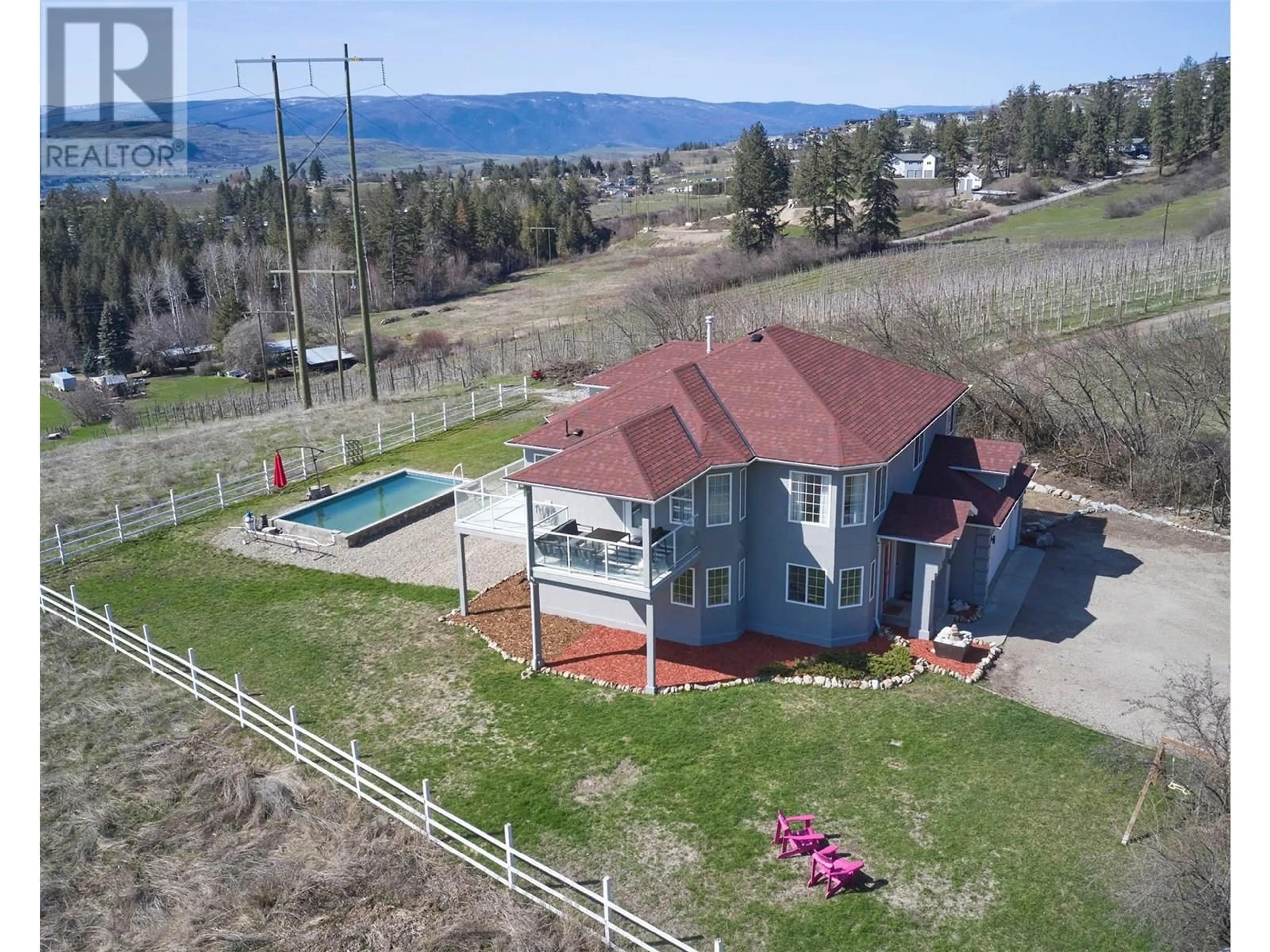 A pic from outside/outdoor area/front of a property/back of a property/a pic from drone, water/lake/river/ocean view for 5596 CURLEW ROAD, Vernon British Columbia V1B3J8