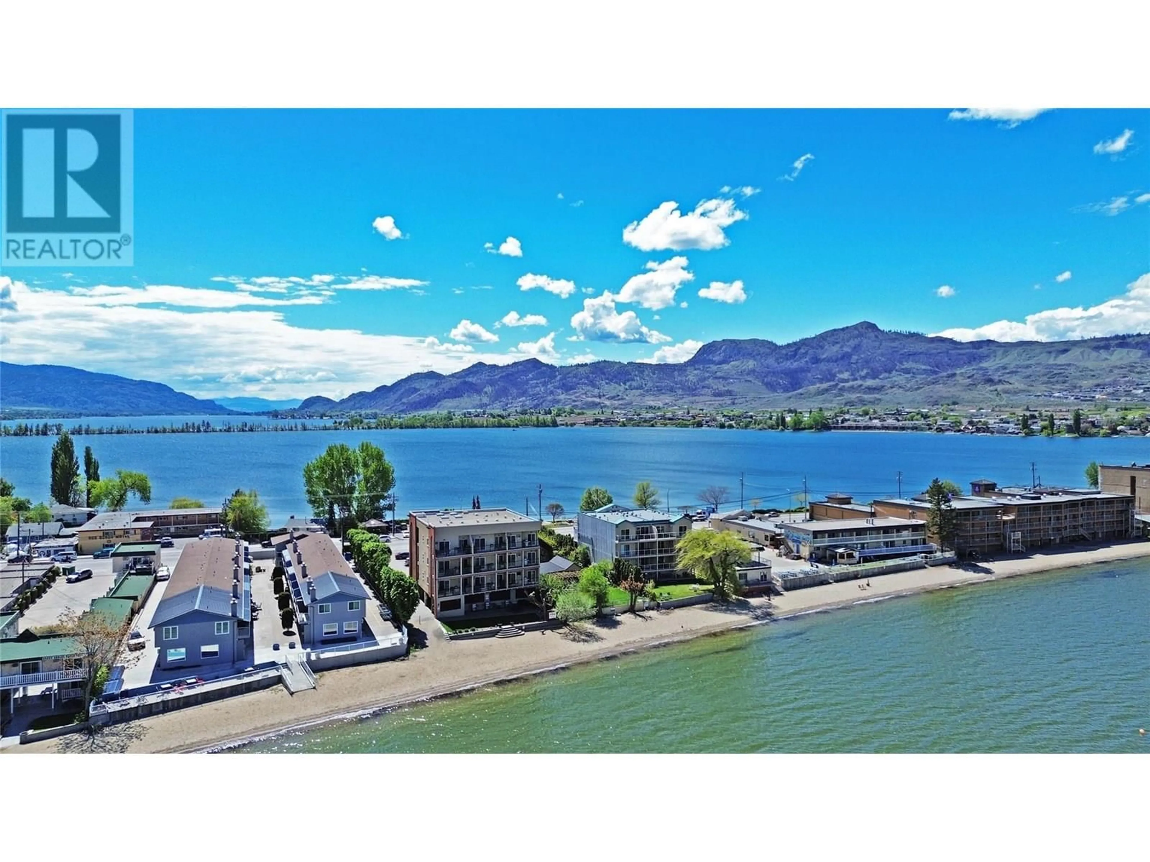 A pic from outside/outdoor area/front of a property/back of a property/a pic from drone, water/lake/river/ocean view for 210 - 7310 MAIN STREET, Osoyoos British Columbia V0H1V0