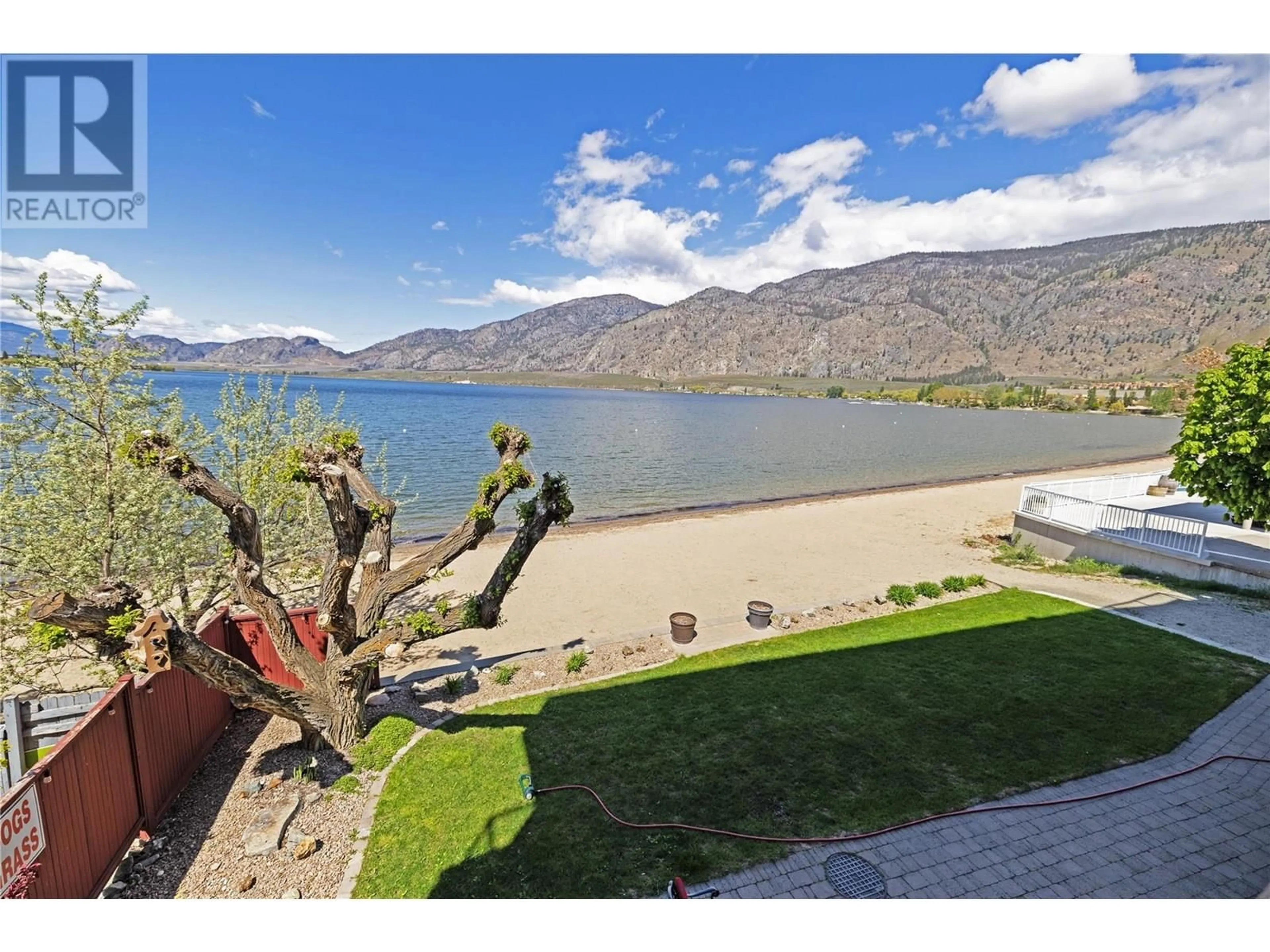 A pic from outside/outdoor area/front of a property/back of a property/a pic from drone, water/lake/river/ocean view for 210 - 7310 MAIN STREET, Osoyoos British Columbia V0H1V0