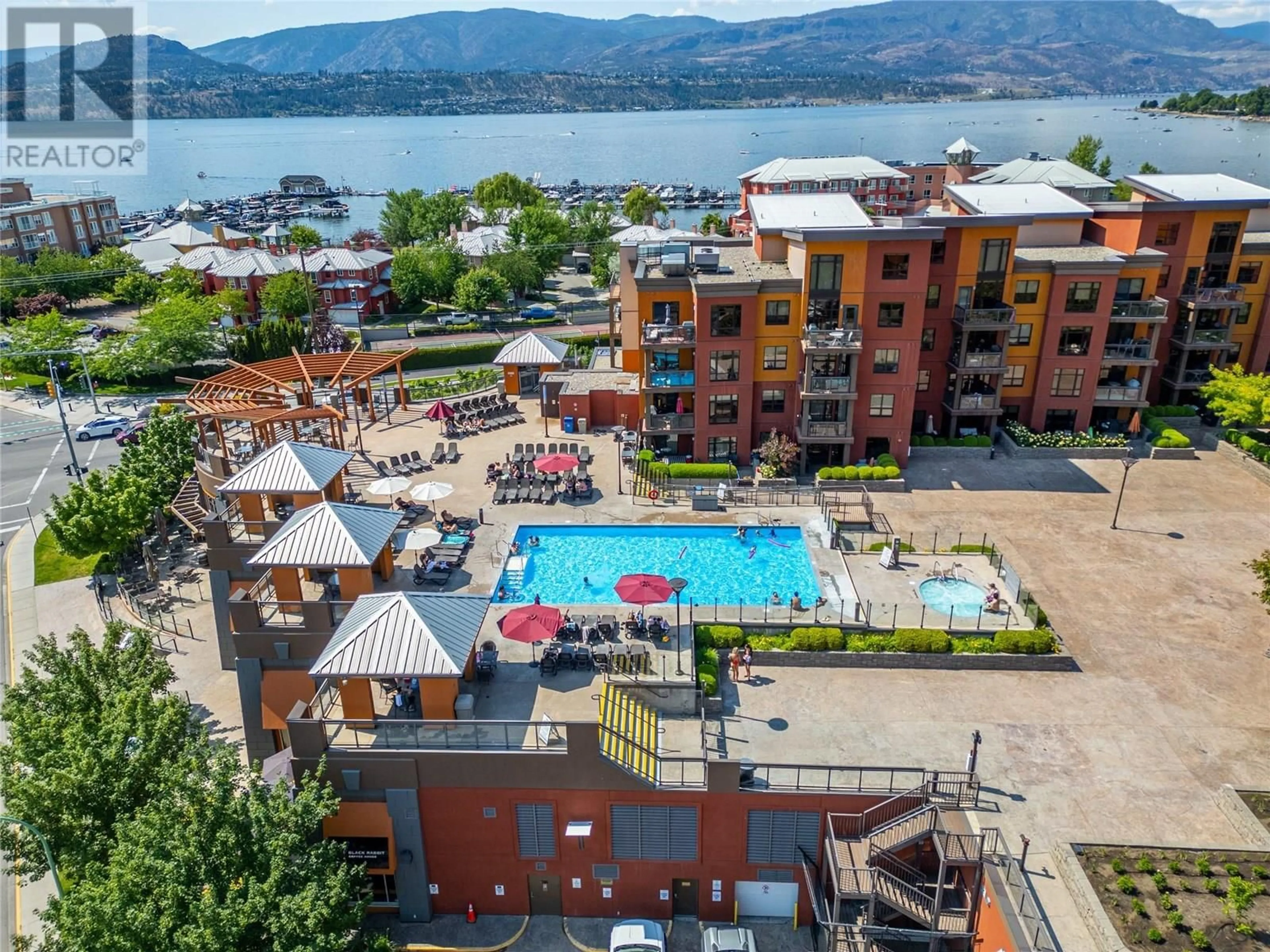 A pic from outside/outdoor area/front of a property/back of a property/a pic from drone, water/lake/river/ocean view for 629 - 654 COOK ROAD, Kelowna British Columbia V1W3G7