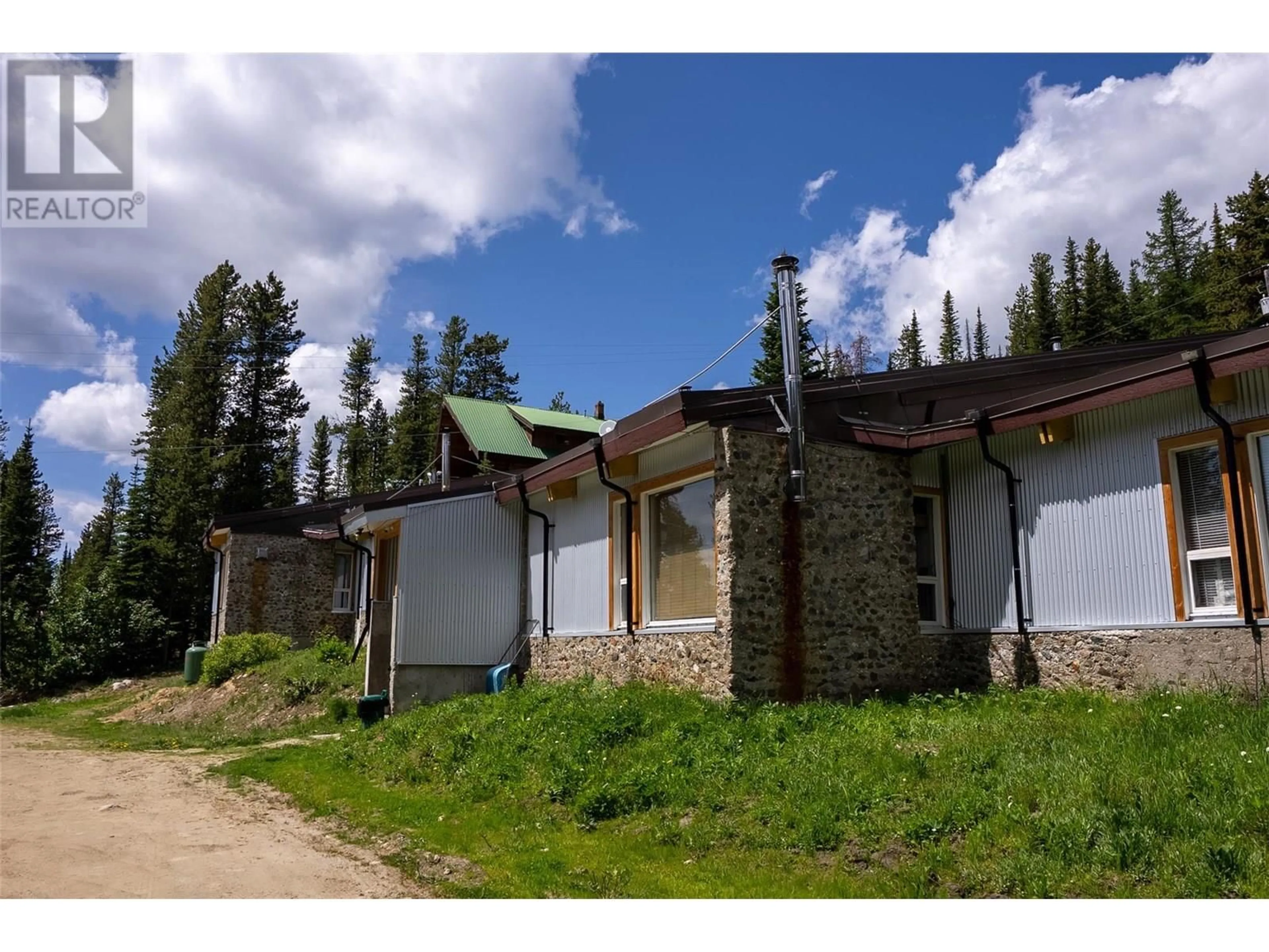 A pic from outside/outdoor area/front of a property/back of a property/a pic from drone, unknown for 6 - 130 COUGAR ROAD, Oliver British Columbia V0H1T8