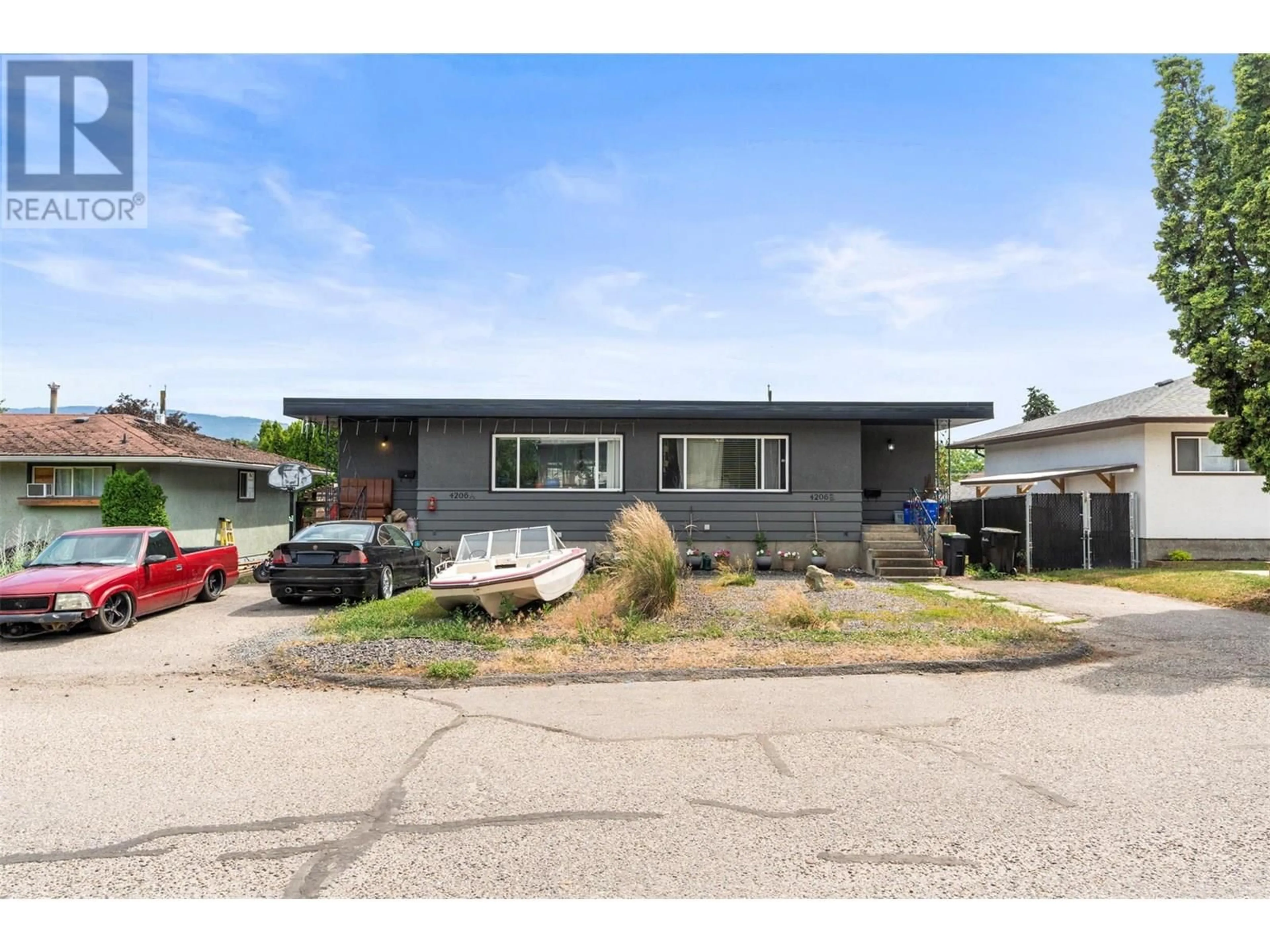 Home with vinyl exterior material, street for 4206 28 AVENUE, Vernon British Columbia V1T7J8