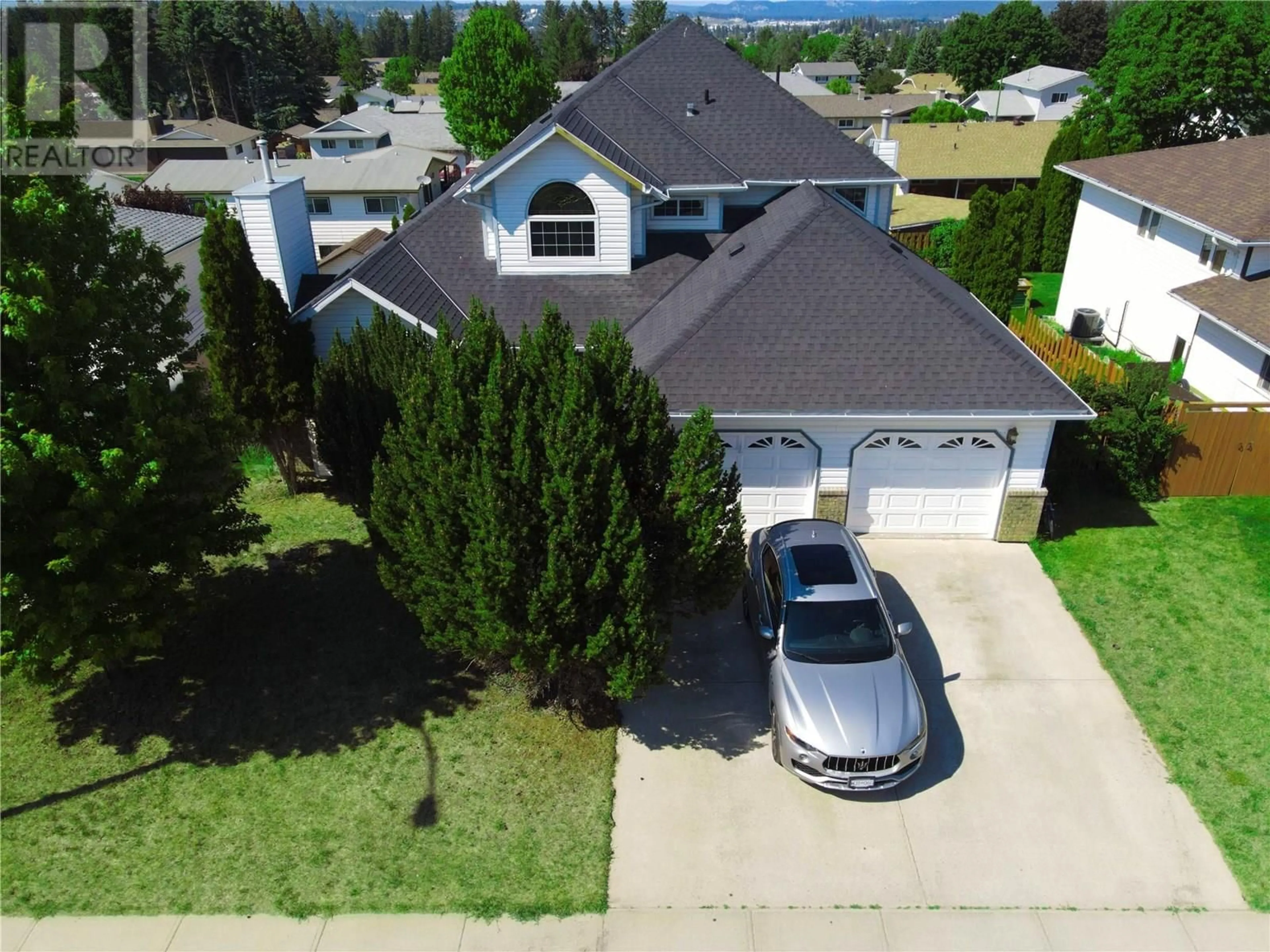 A pic from outside/outdoor area/front of a property/back of a property/a pic from drone, street for 1312 20TH STREET SOUTH, Cranbrook British Columbia V1C6J8