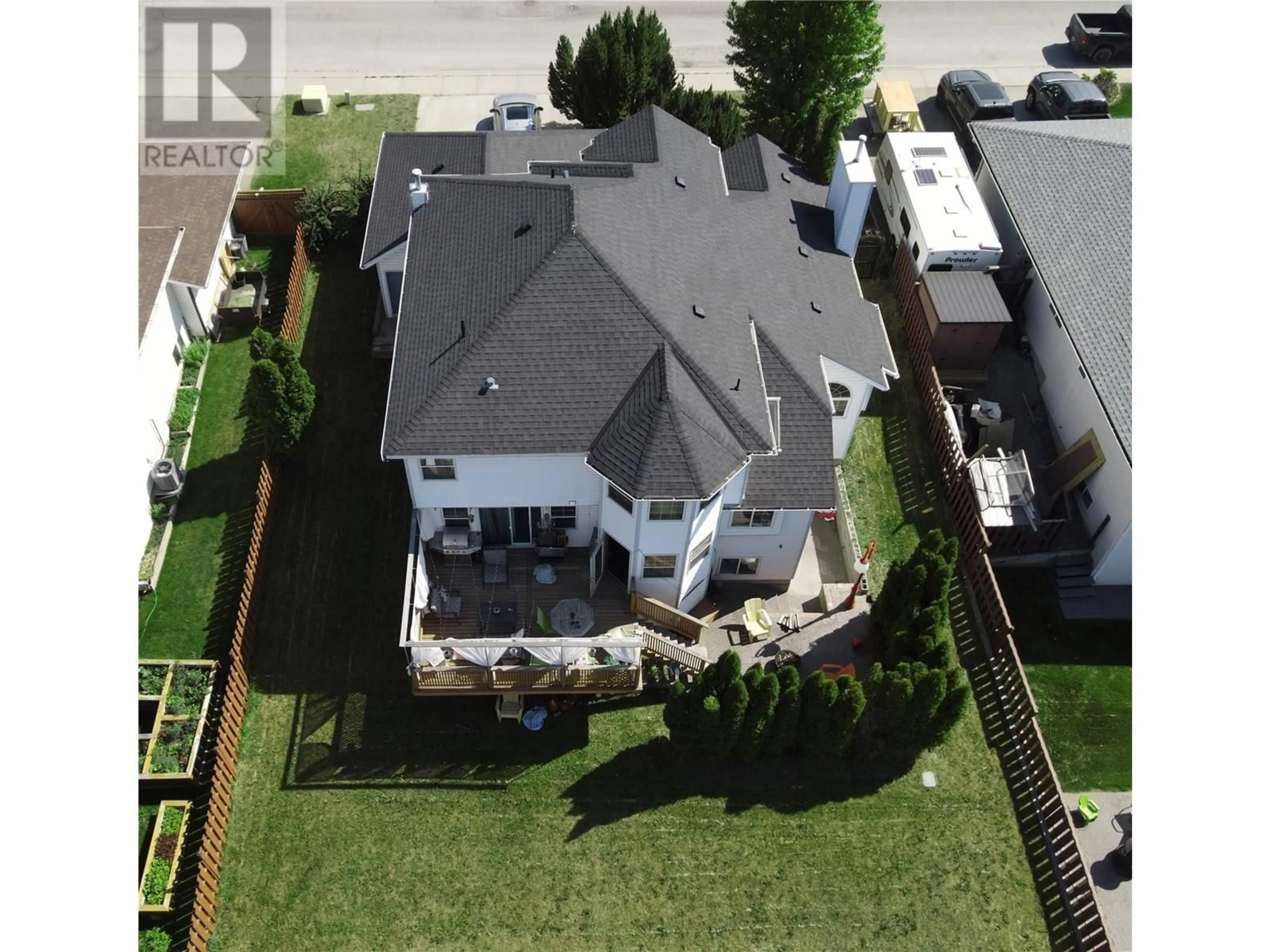 A pic from outside/outdoor area/front of a property/back of a property/a pic from drone, street for 1312 20TH STREET SOUTH, Cranbrook British Columbia V1C6J8