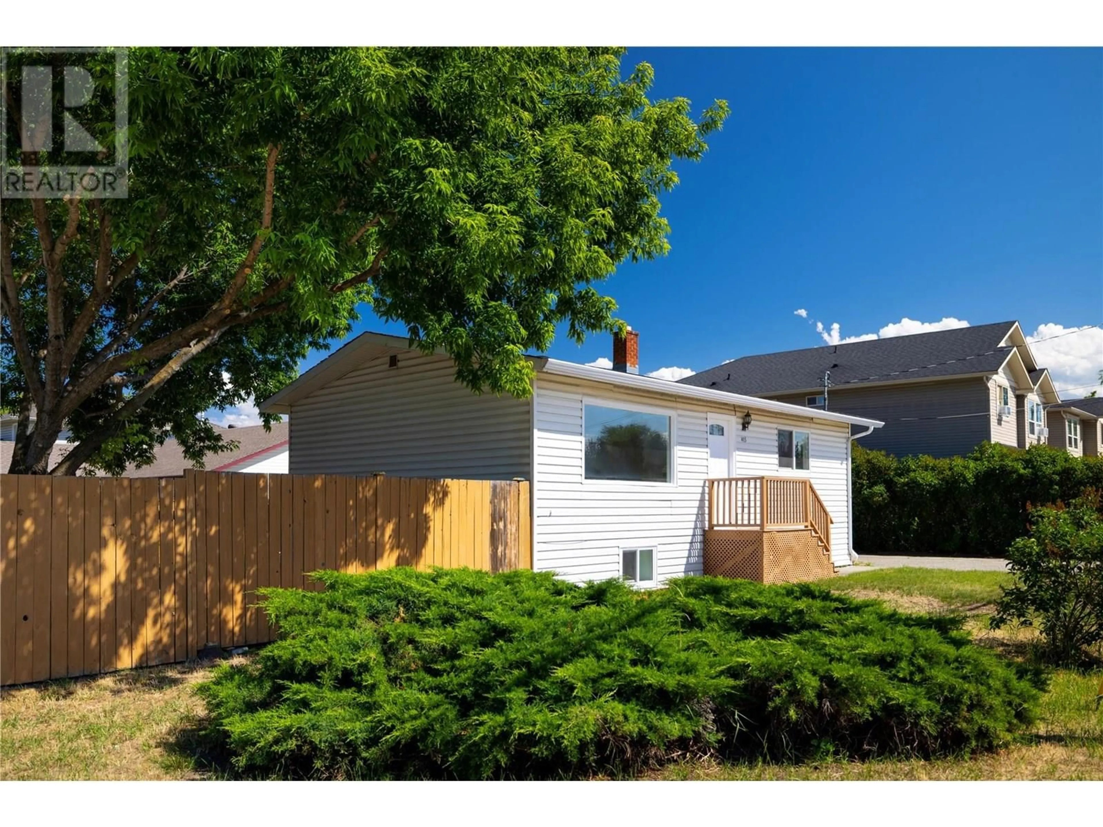 Home with vinyl exterior material, street for 415 GERSTMAR ROAD, Kelowna British Columbia V1X4B2