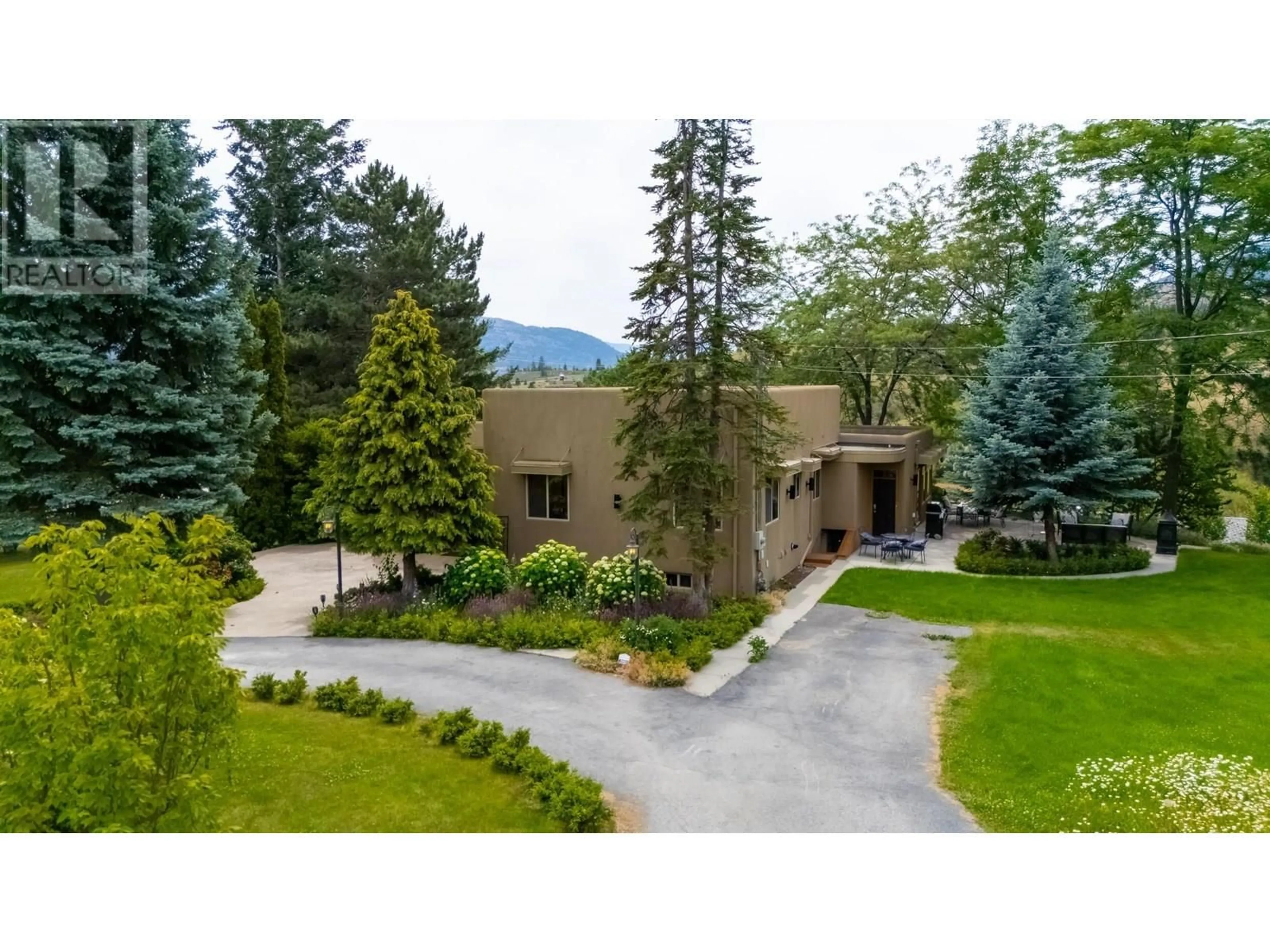 A pic from outside/outdoor area/front of a property/back of a property/a pic from drone, mountain view for 119 SUNGLO DRIVE, Penticton British Columbia V2A8X6