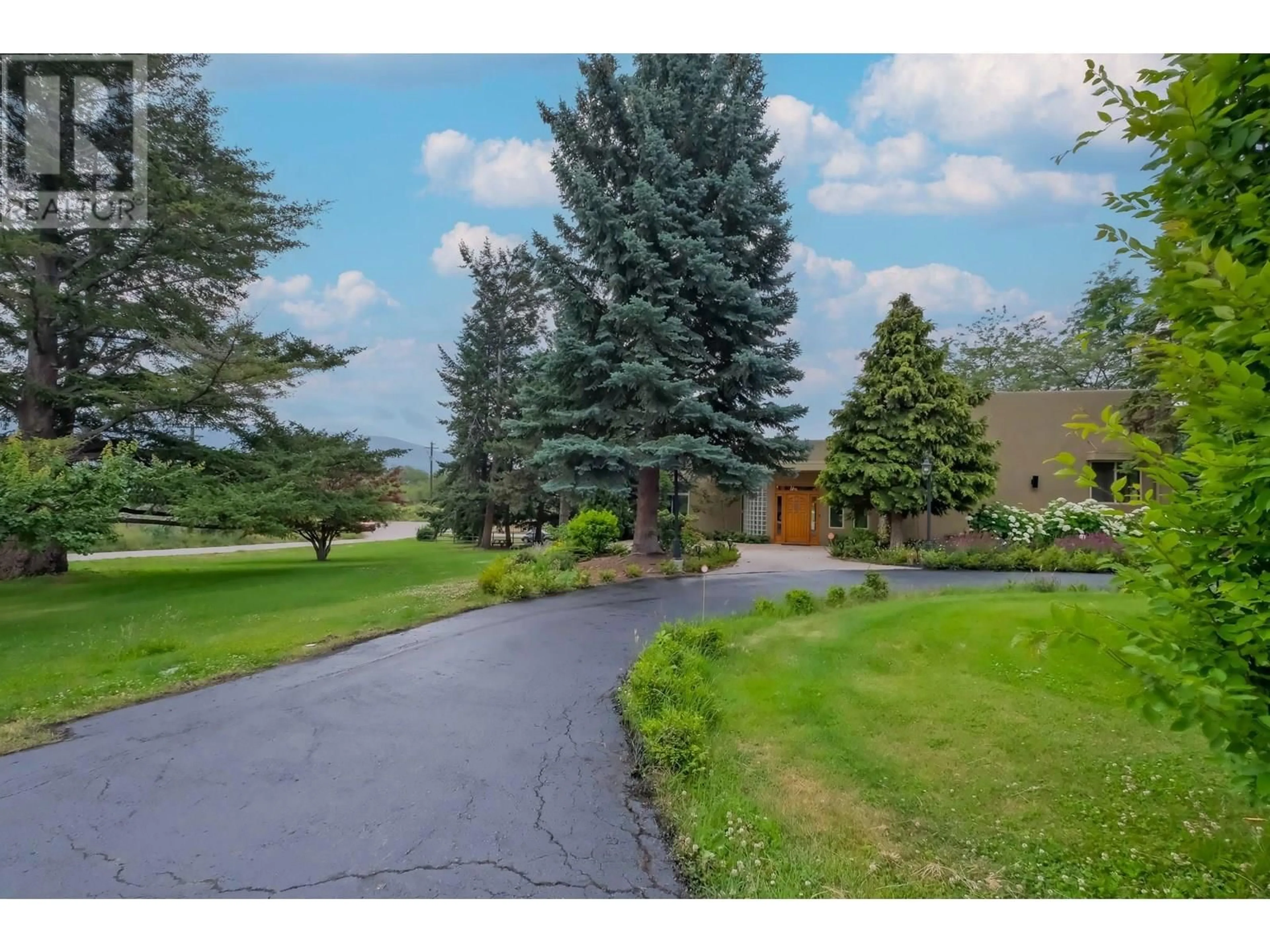 A pic from outside/outdoor area/front of a property/back of a property/a pic from drone, mountain view for 119 SUNGLO DRIVE, Penticton British Columbia V2A8X6