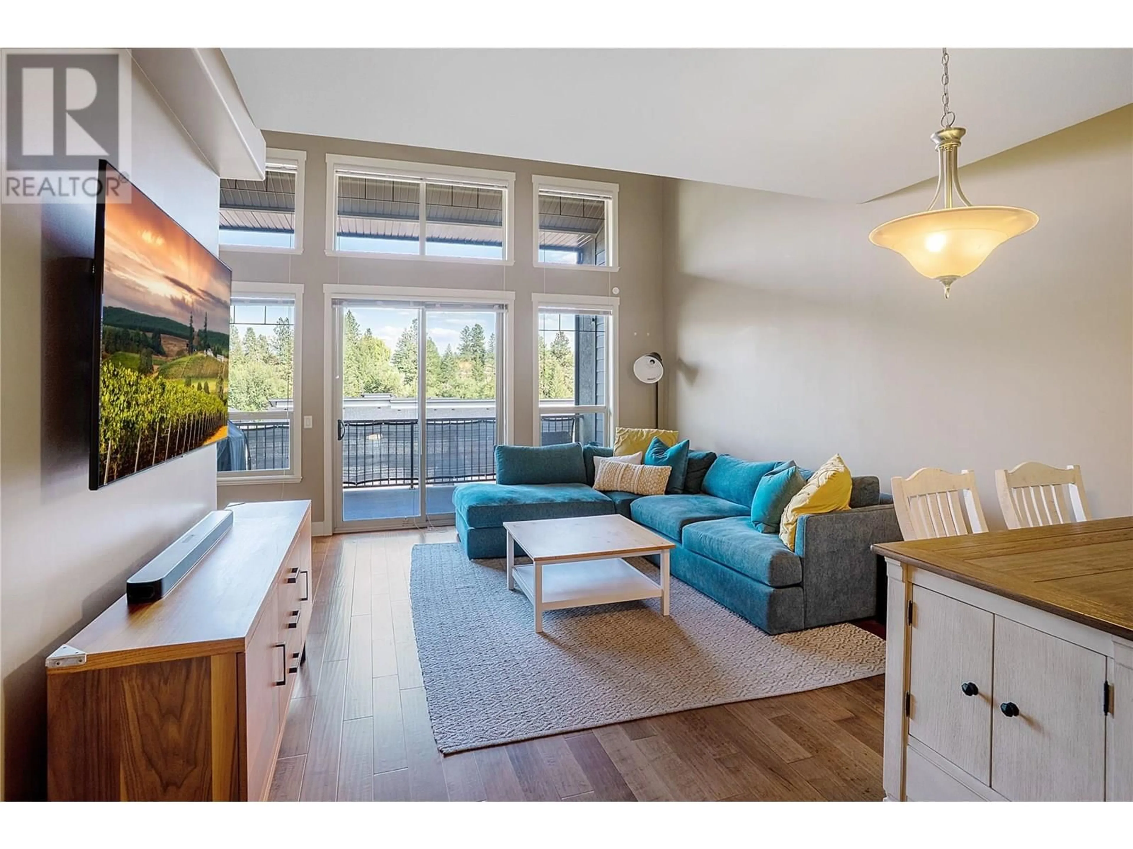 Living room with furniture, wood/laminate floor for 14 - 3359 COUGAR ROAD, West Kelowna British Columbia V4T3G1