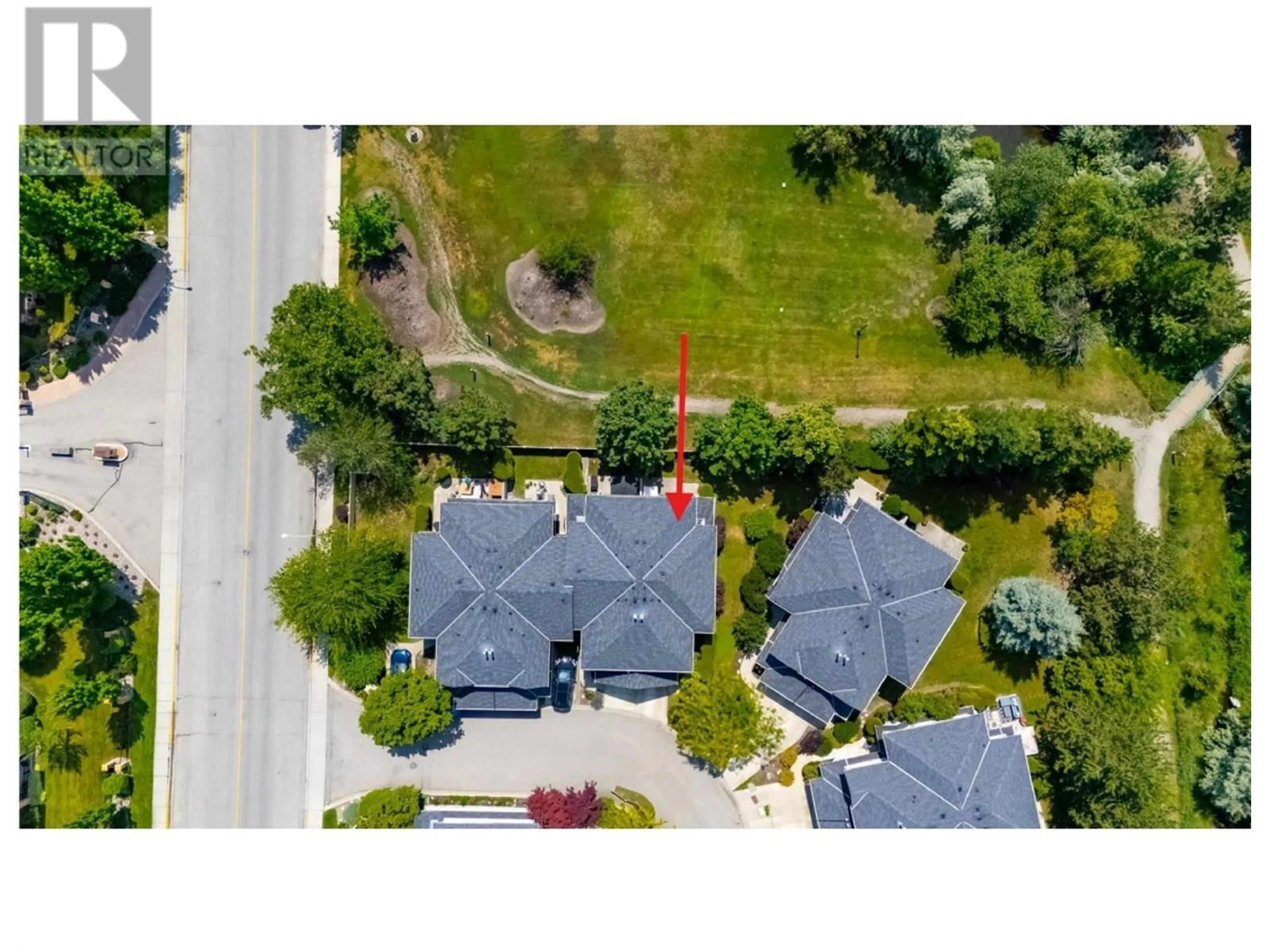 A pic from outside/outdoor area/front of a property/back of a property/a pic from drone, street for 4 - 316 WHITMAN ROAD, Kelowna British Columbia V1V1Y9