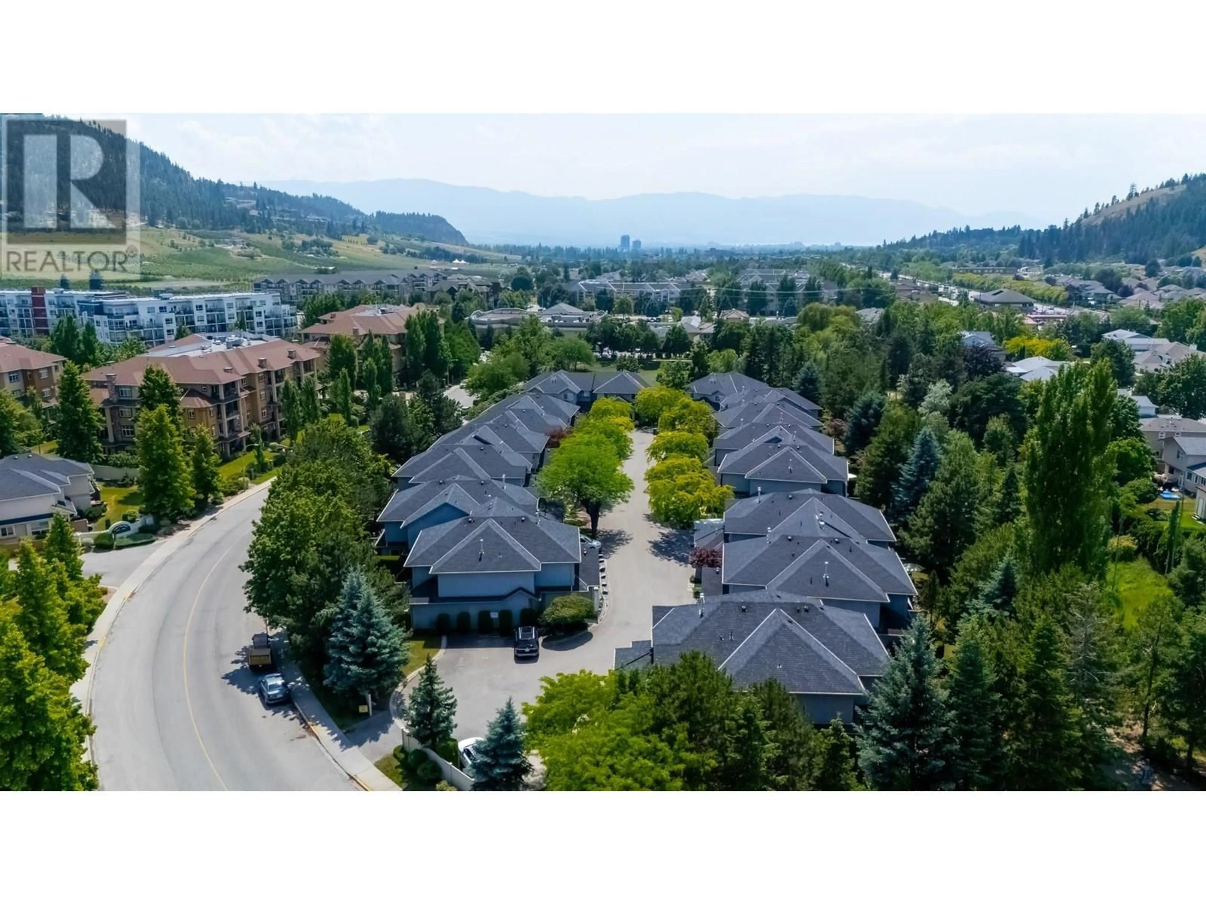 A pic from outside/outdoor area/front of a property/back of a property/a pic from drone, mountain view for 4 - 316 WHITMAN ROAD, Kelowna British Columbia V1V1Y9