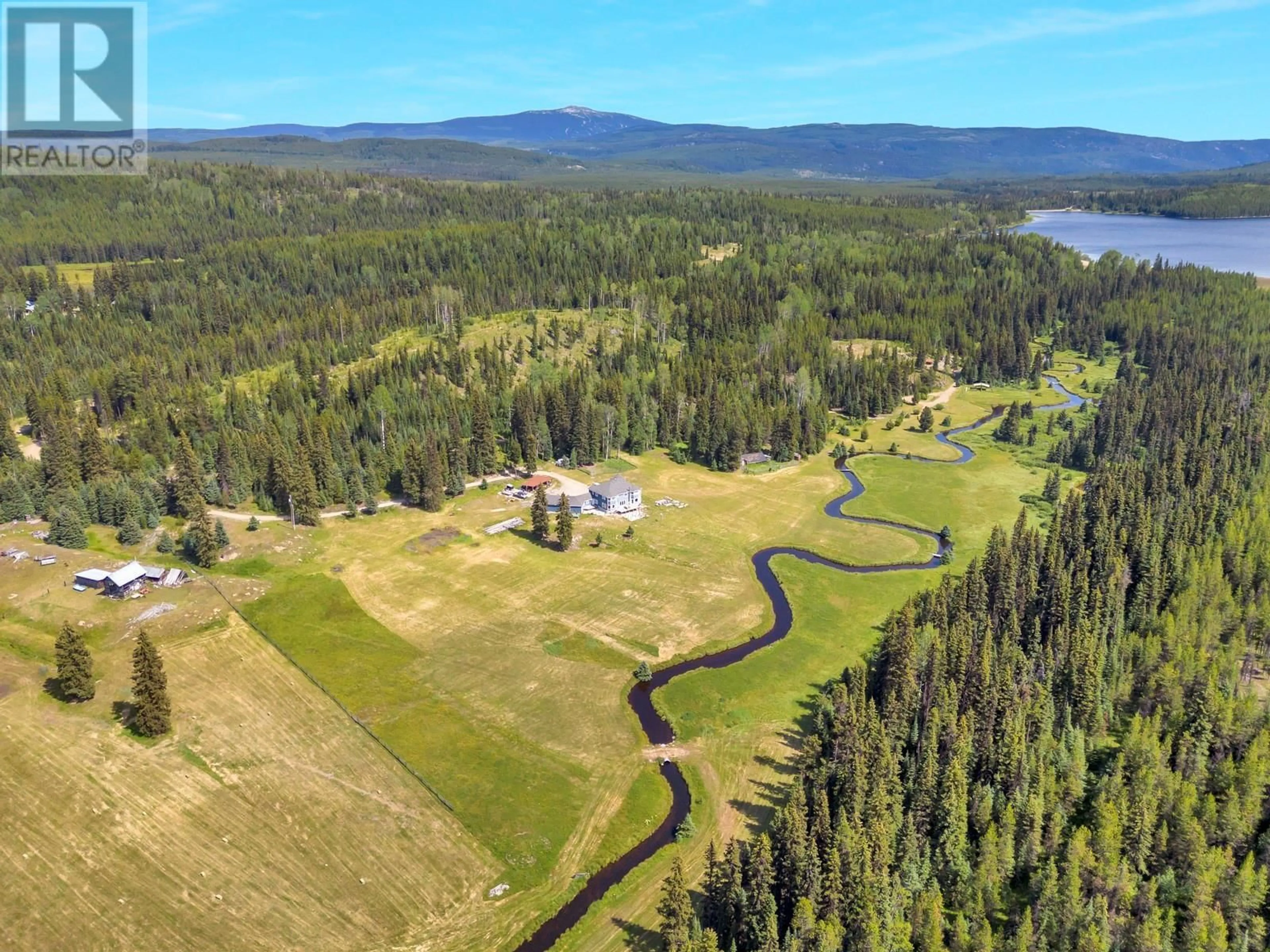 A pic from outside/outdoor area/front of a property/back of a property/a pic from drone, water/lake/river/ocean view for 9205 MCCULLOCH ROAD, Kelowna British Columbia V1P1K3