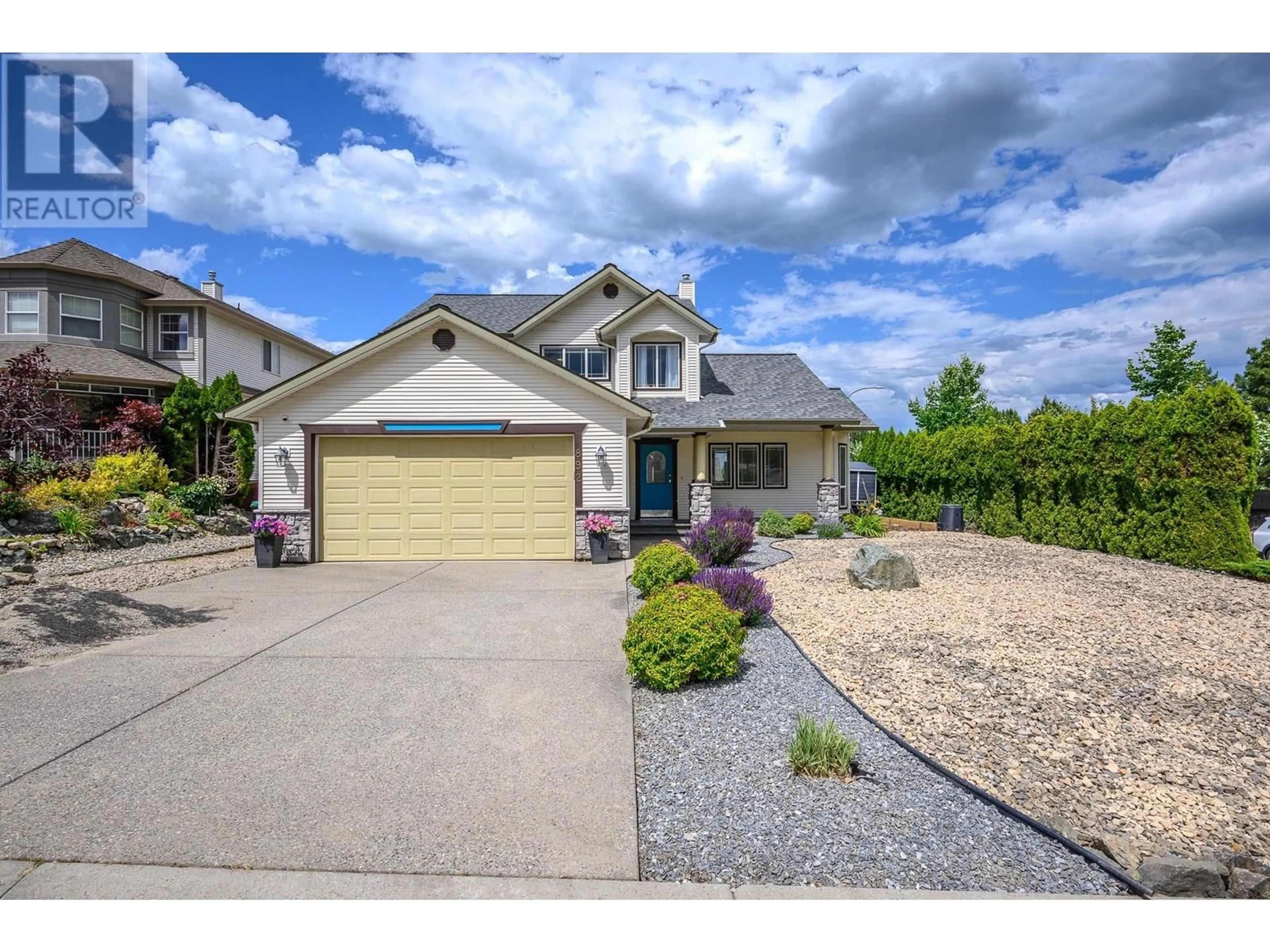 Home with vinyl exterior material, street for 892 MT GRIFFIN PLACE, Vernon British Columbia V1B3V5