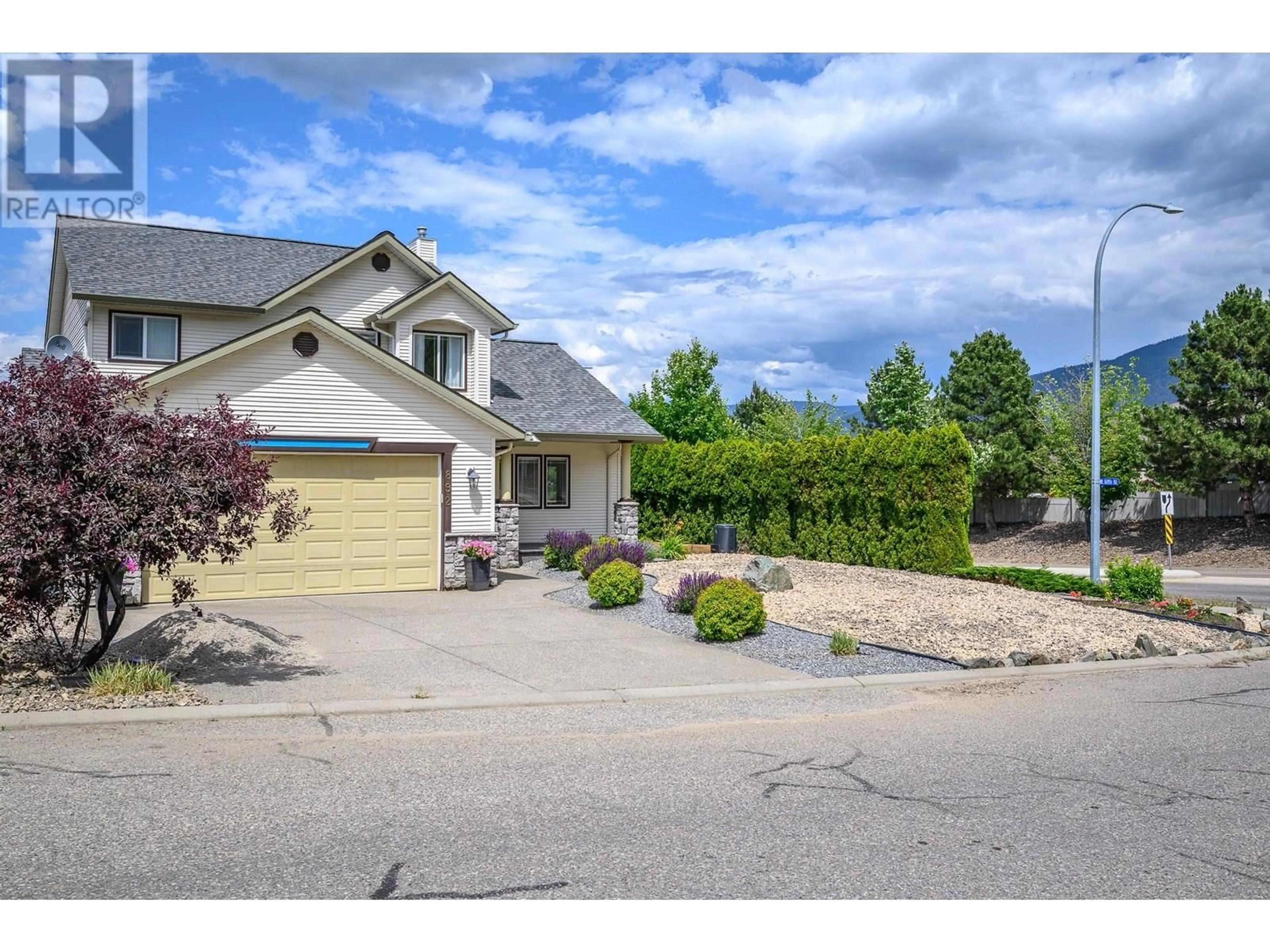 A pic from outside/outdoor area/front of a property/back of a property/a pic from drone, street for 892 MT GRIFFIN PLACE, Vernon British Columbia V1B3V5