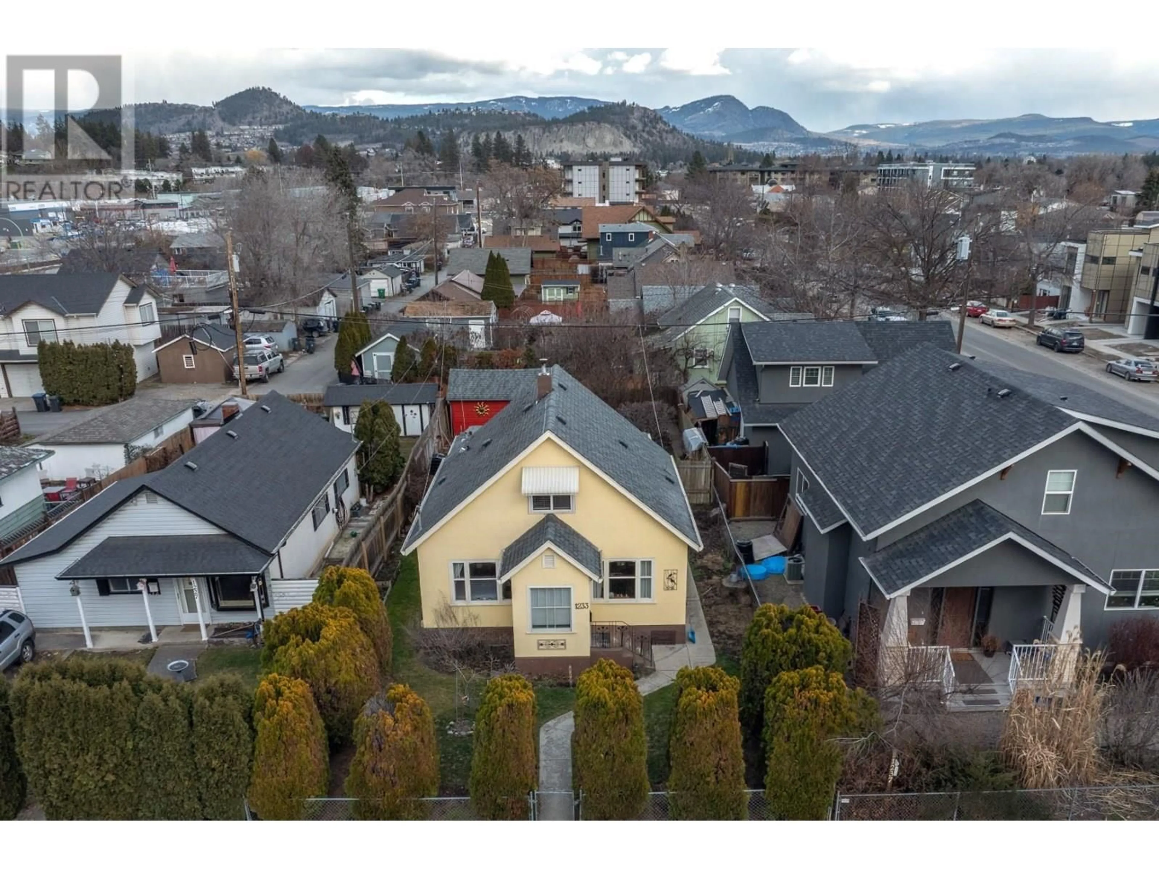 A pic from outside/outdoor area/front of a property/back of a property/a pic from drone, mountain view for 1233 ETHEL STREET, Kelowna British Columbia V1Y2W6