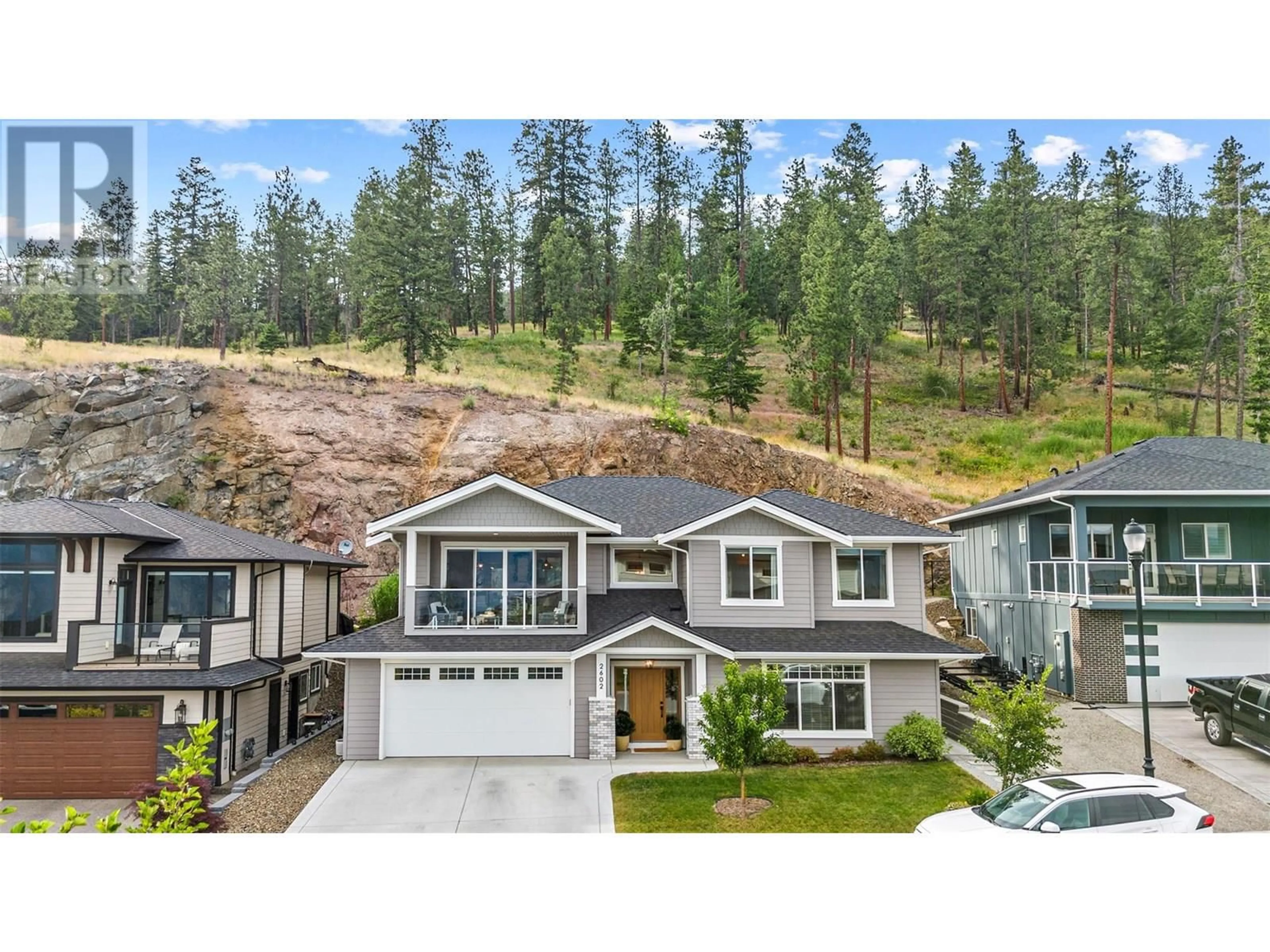 A pic from outside/outdoor area/front of a property/back of a property/a pic from drone, mountain view for 2602 CROWN CREST DRIVE, West Kelowna British Columbia V4T3N3