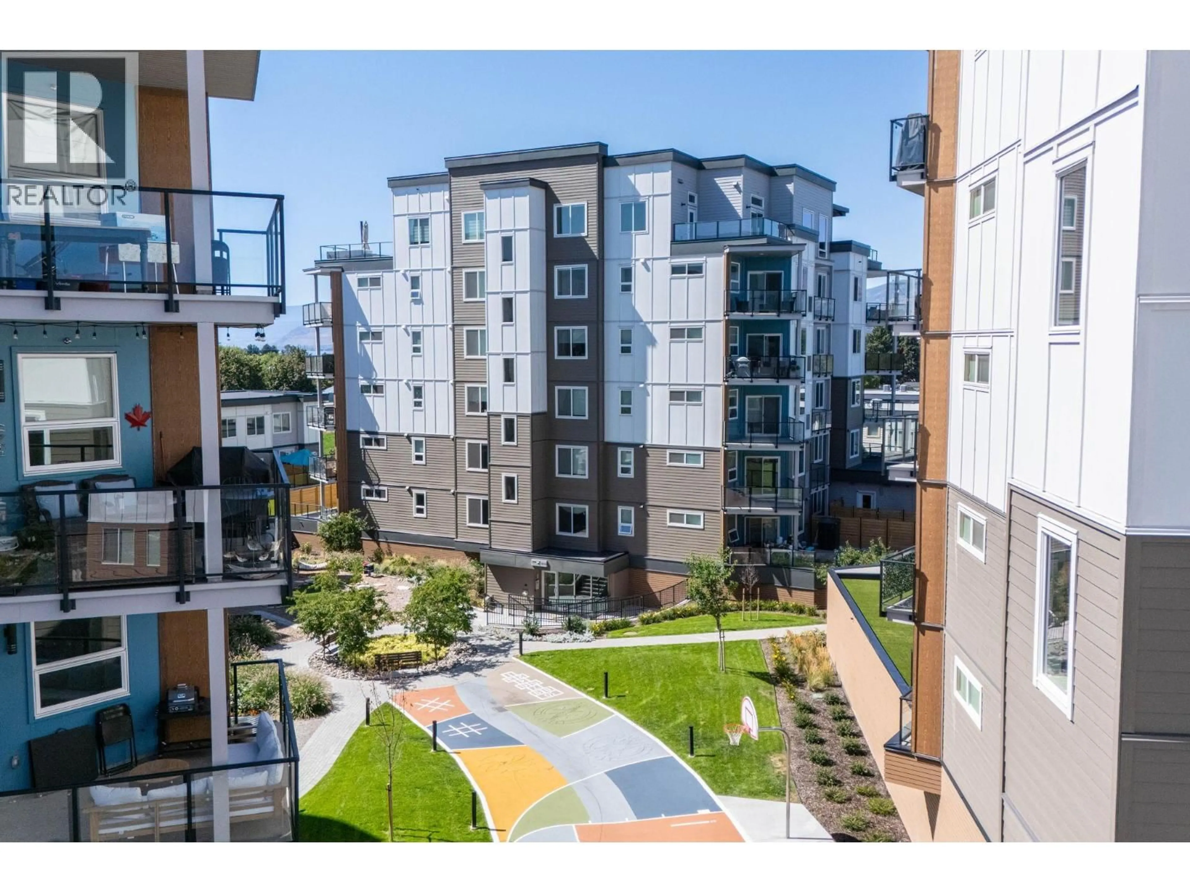 A pic from outside/outdoor area/front of a property/back of a property/a pic from drone, city buildings view from balcony for 403 - 3634 MISSION SPRINGS DRIVE, Kelowna British Columbia V1W0C9