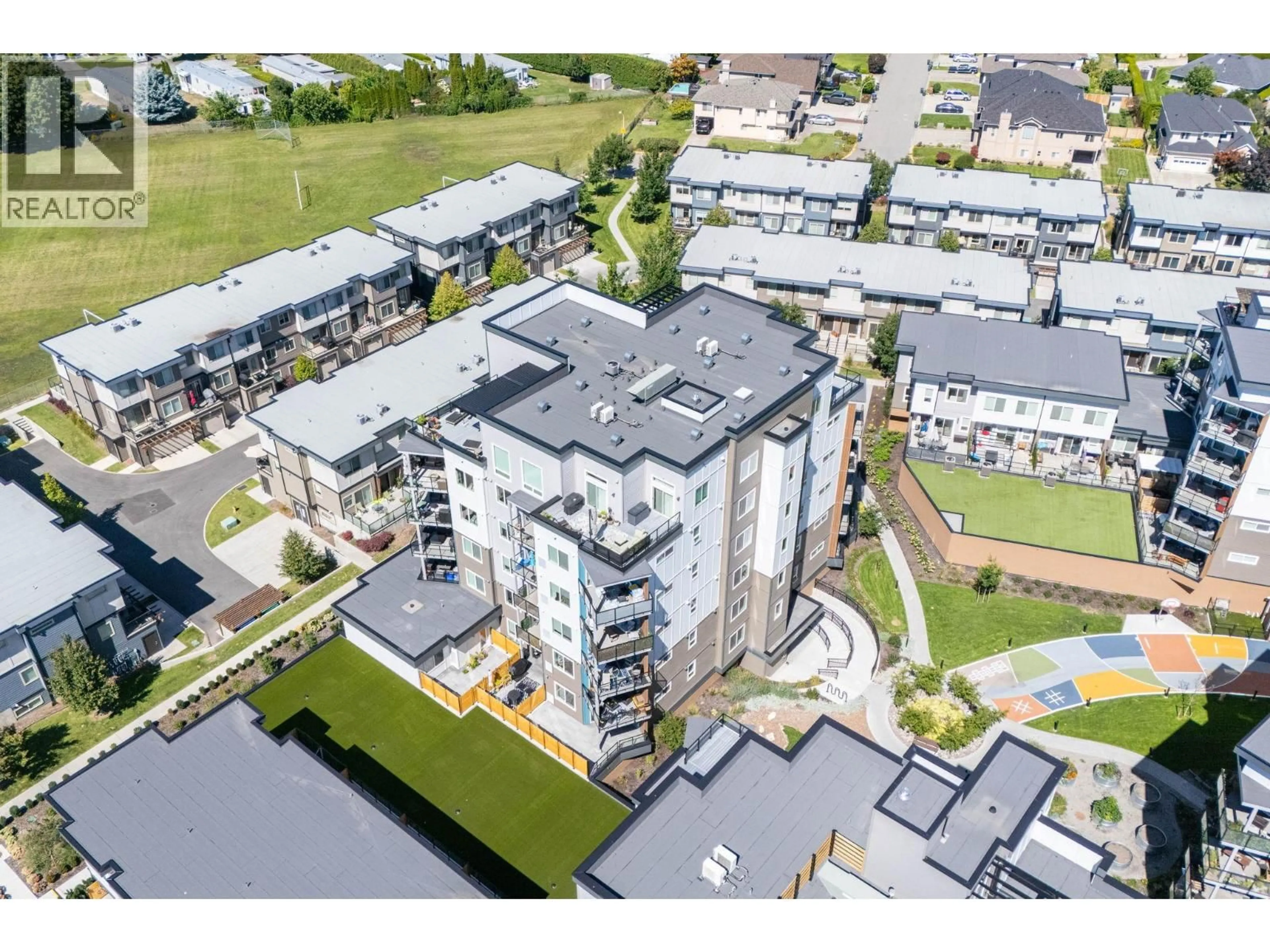 A pic from outside/outdoor area/front of a property/back of a property/a pic from drone, unknown for 403 - 3634 MISSION SPRINGS DRIVE, Kelowna British Columbia V1W0C9