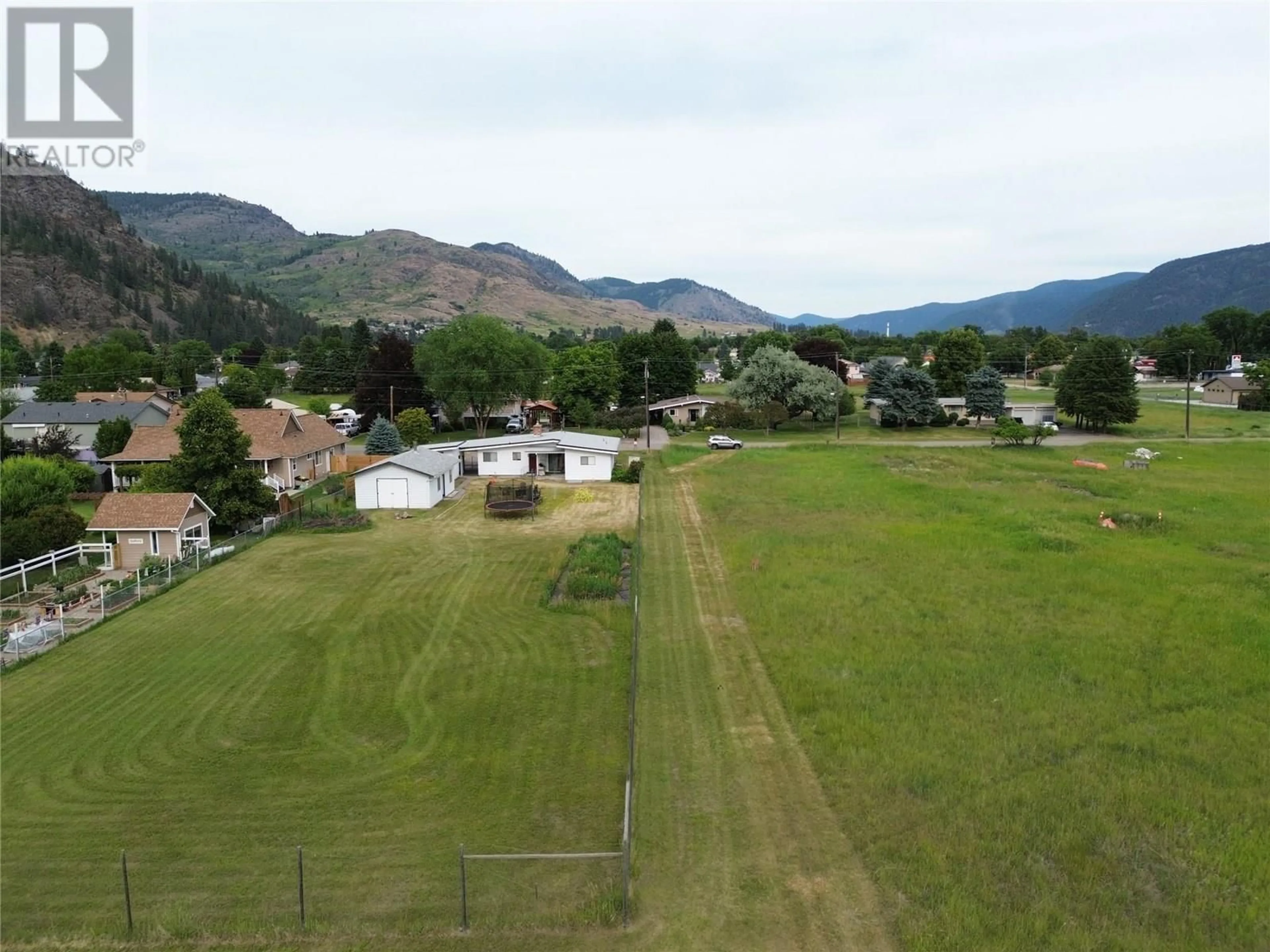A pic from outside/outdoor area/front of a property/back of a property/a pic from drone, mountain view for 7591 17TH STREET, Grand Forks British Columbia V0H1H2