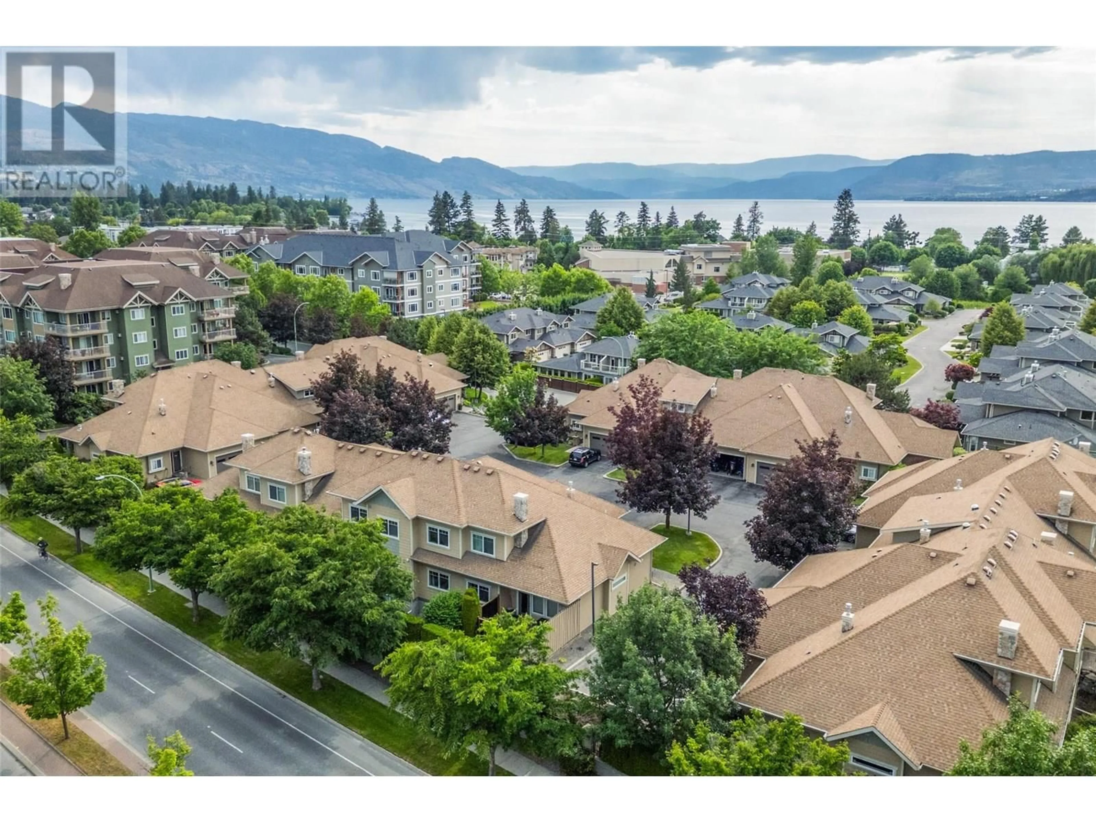 A pic from outside/outdoor area/front of a property/back of a property/a pic from drone, mountain view for 106 - 690 LEQUIME ROAD, Kelowna British Columbia V1W5B8
